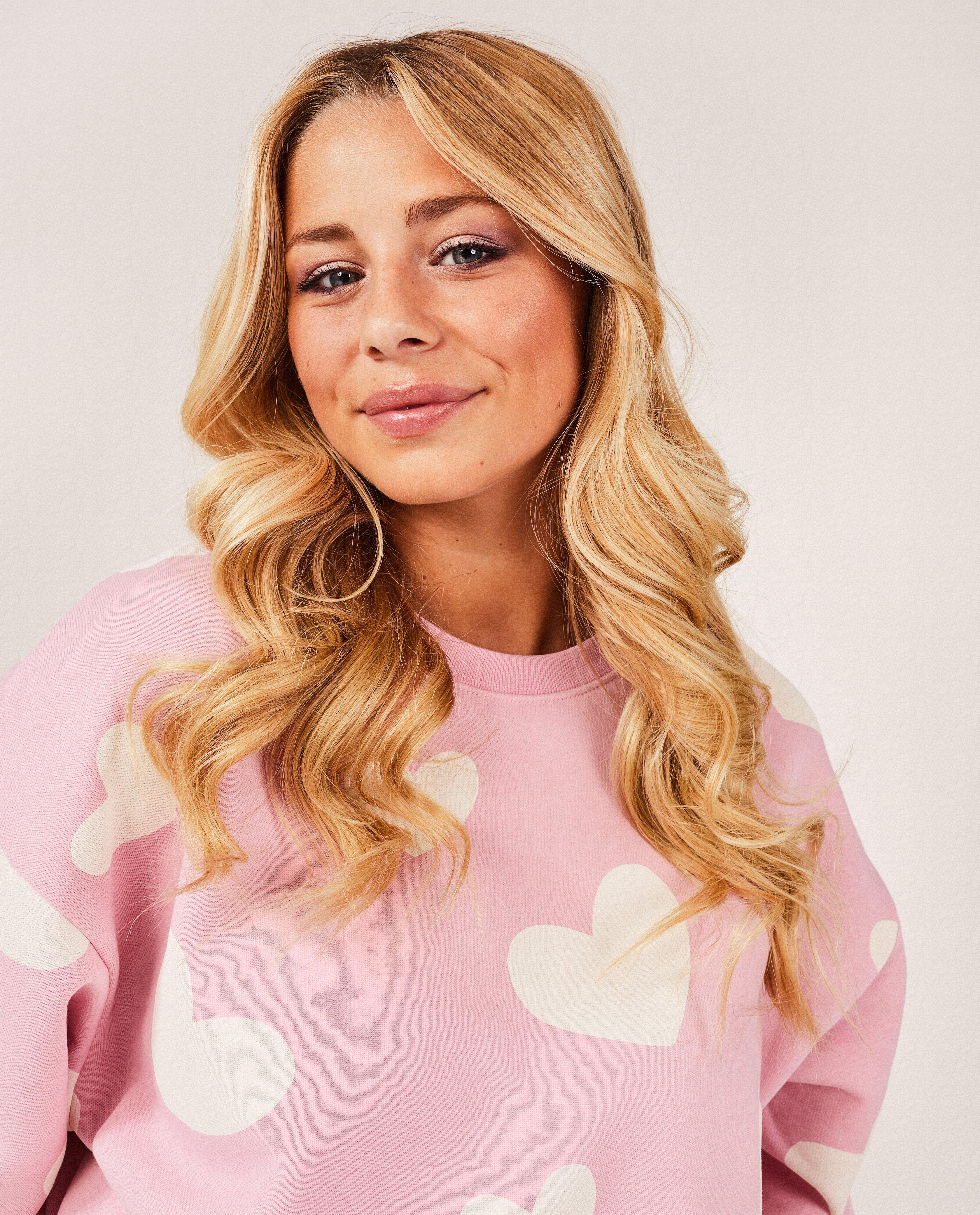 Sweaters - Roze sweater met hartjespatroon