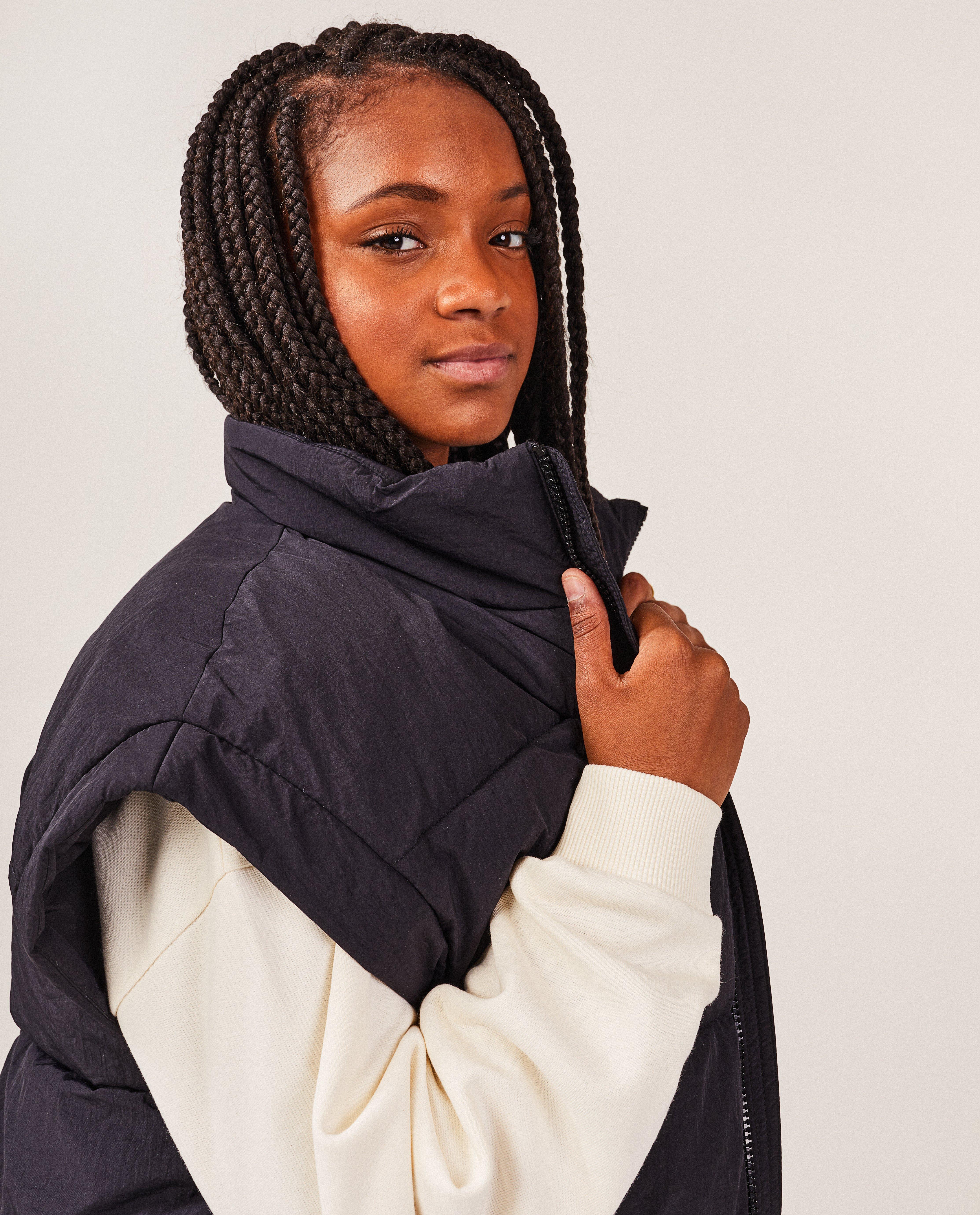 Poncho's en teddy's - Zwarte bodywarmer
