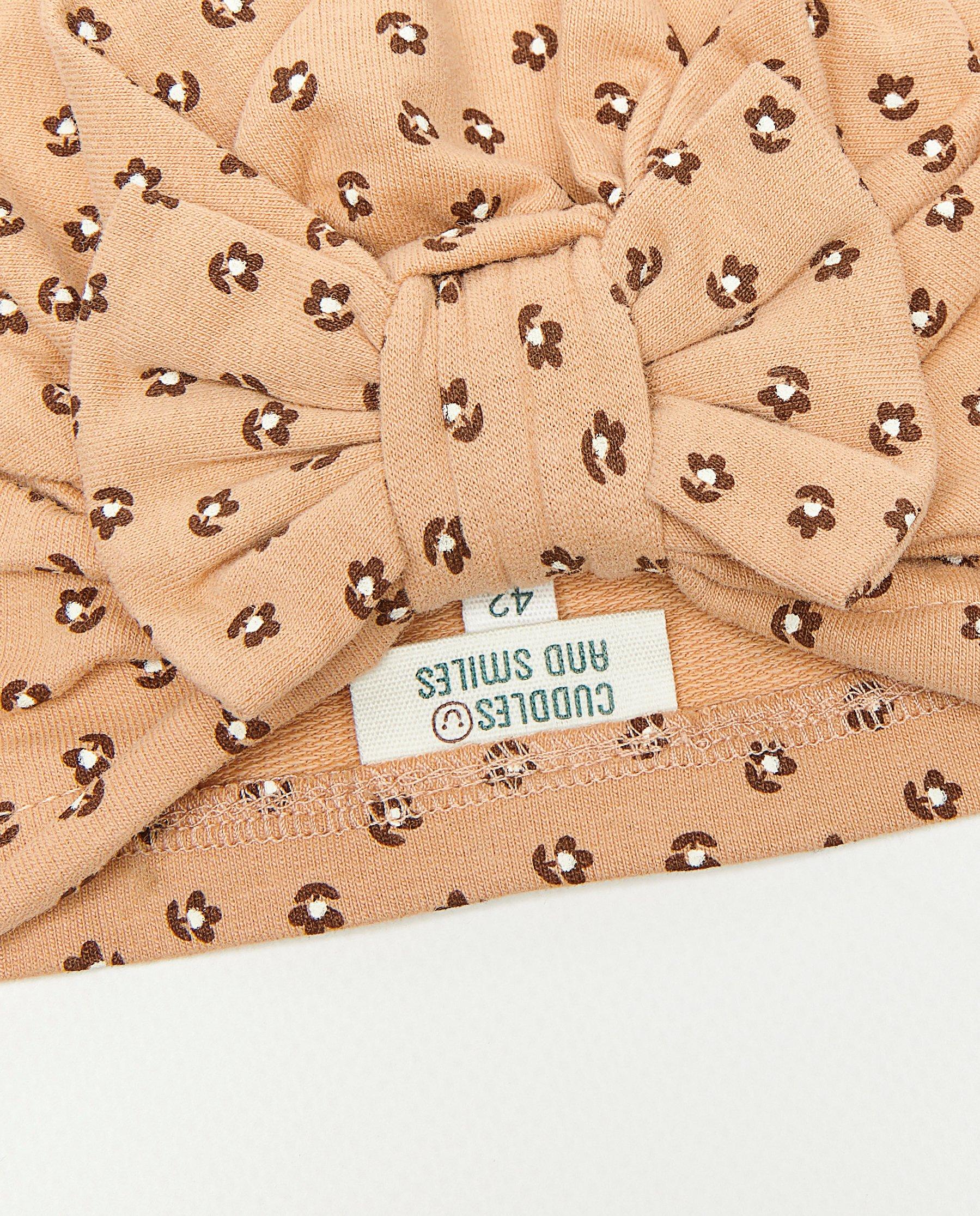 Breigoed - Muts met bloemenprint