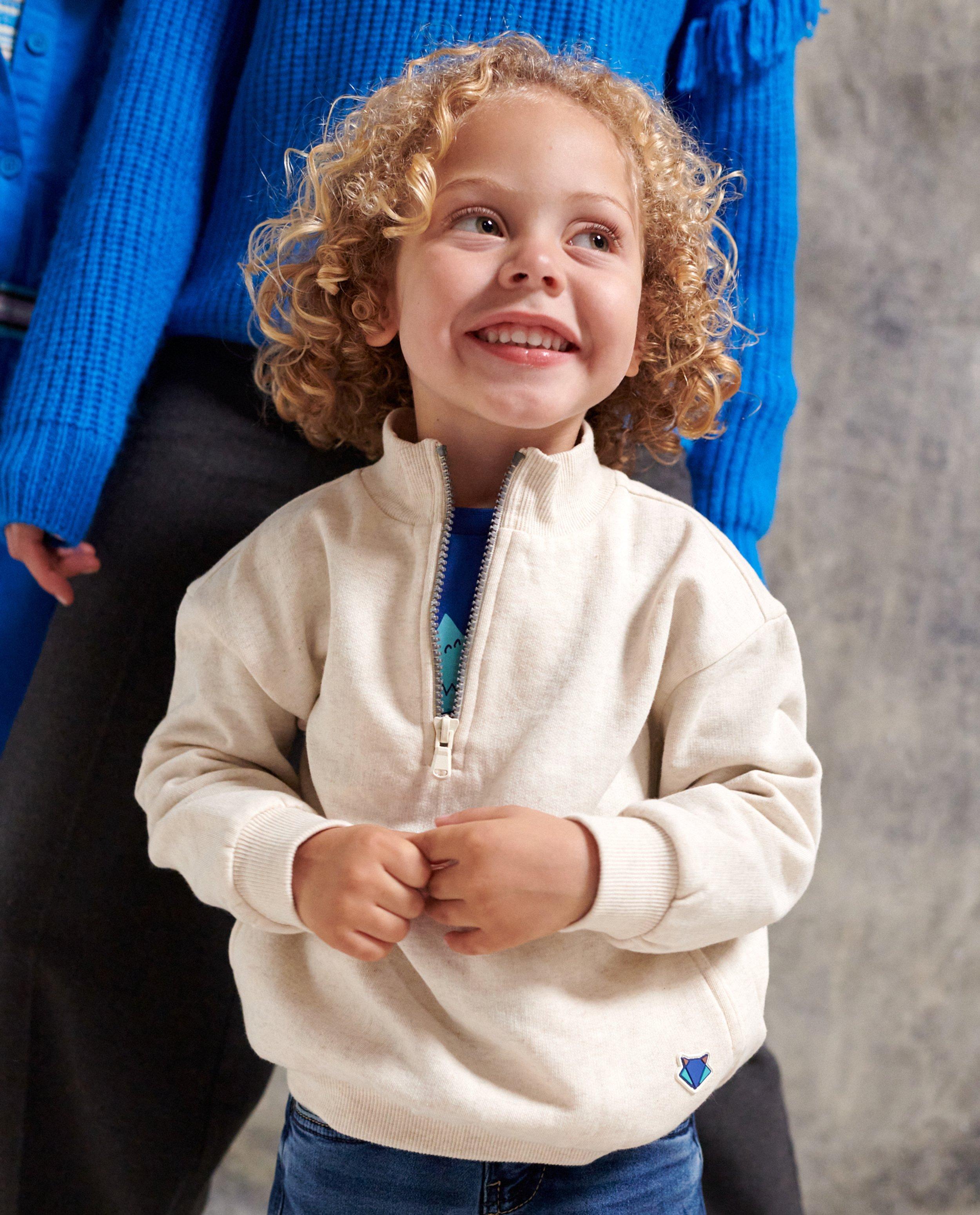 Sweaters - Beige sweater met korte rits