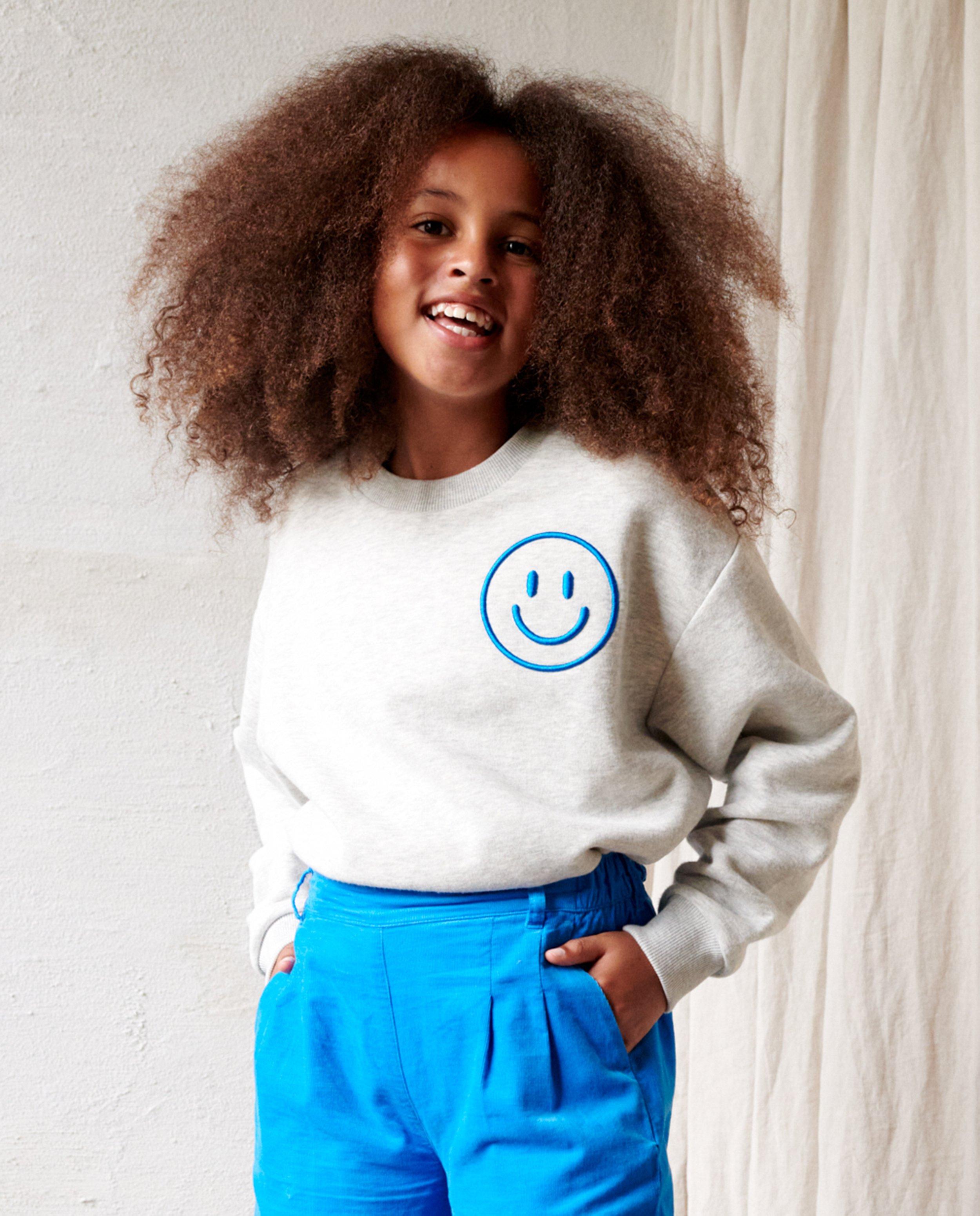 Sweaters - Sweater met geborduurde smiley