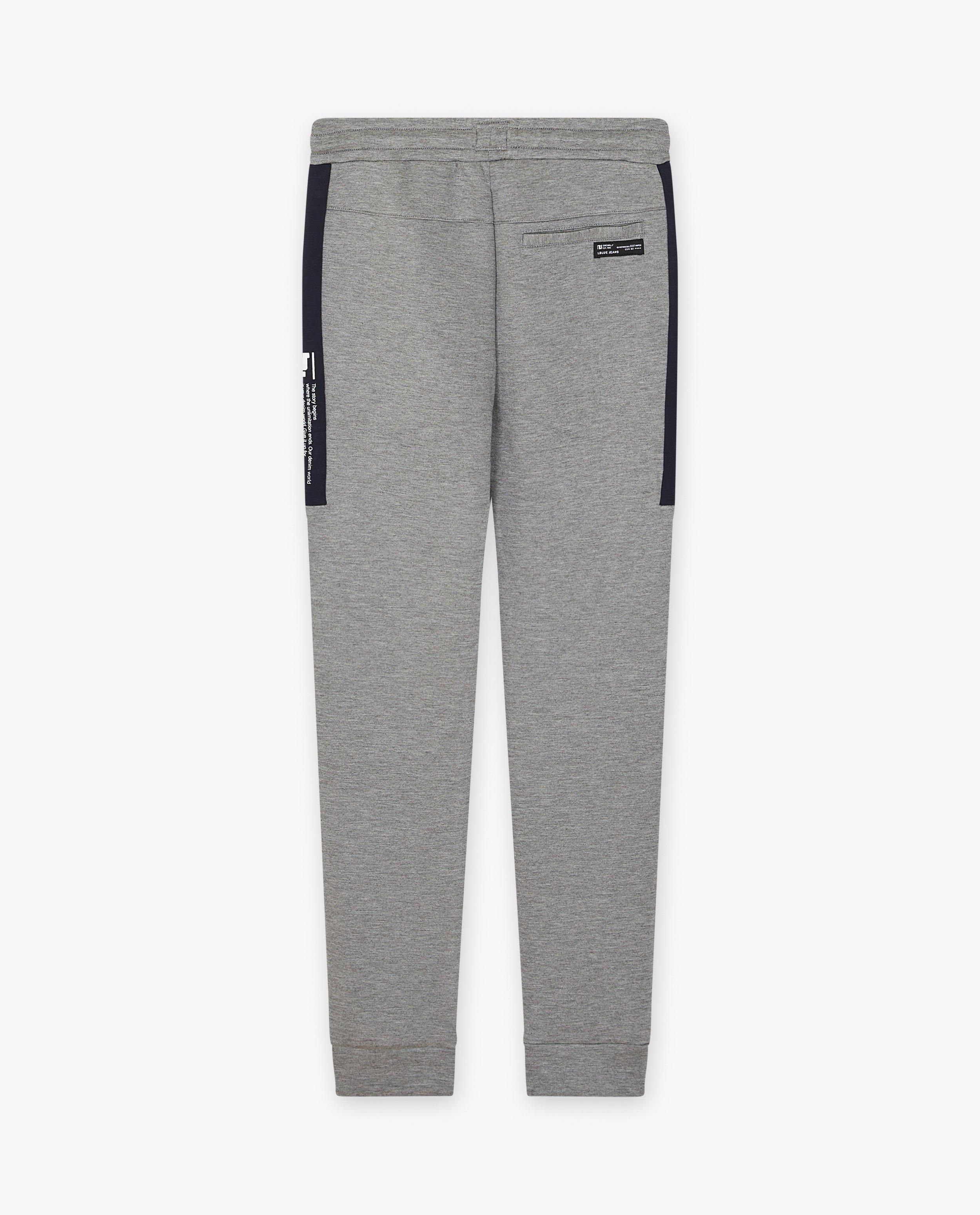 Broeken - Grijze joggingbroek met sierbiezen