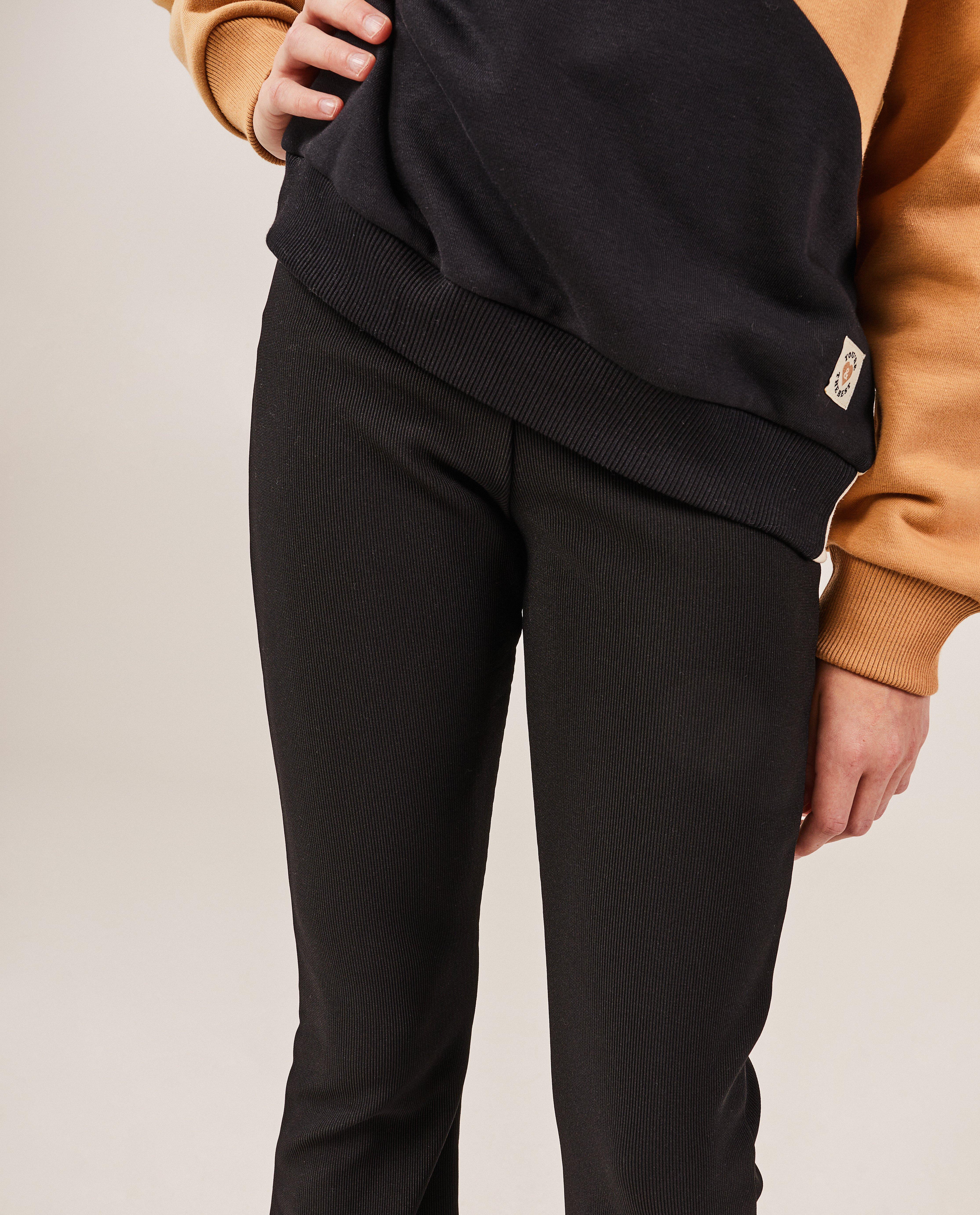 Leggings - Donkergroene legging met rib, flared fit