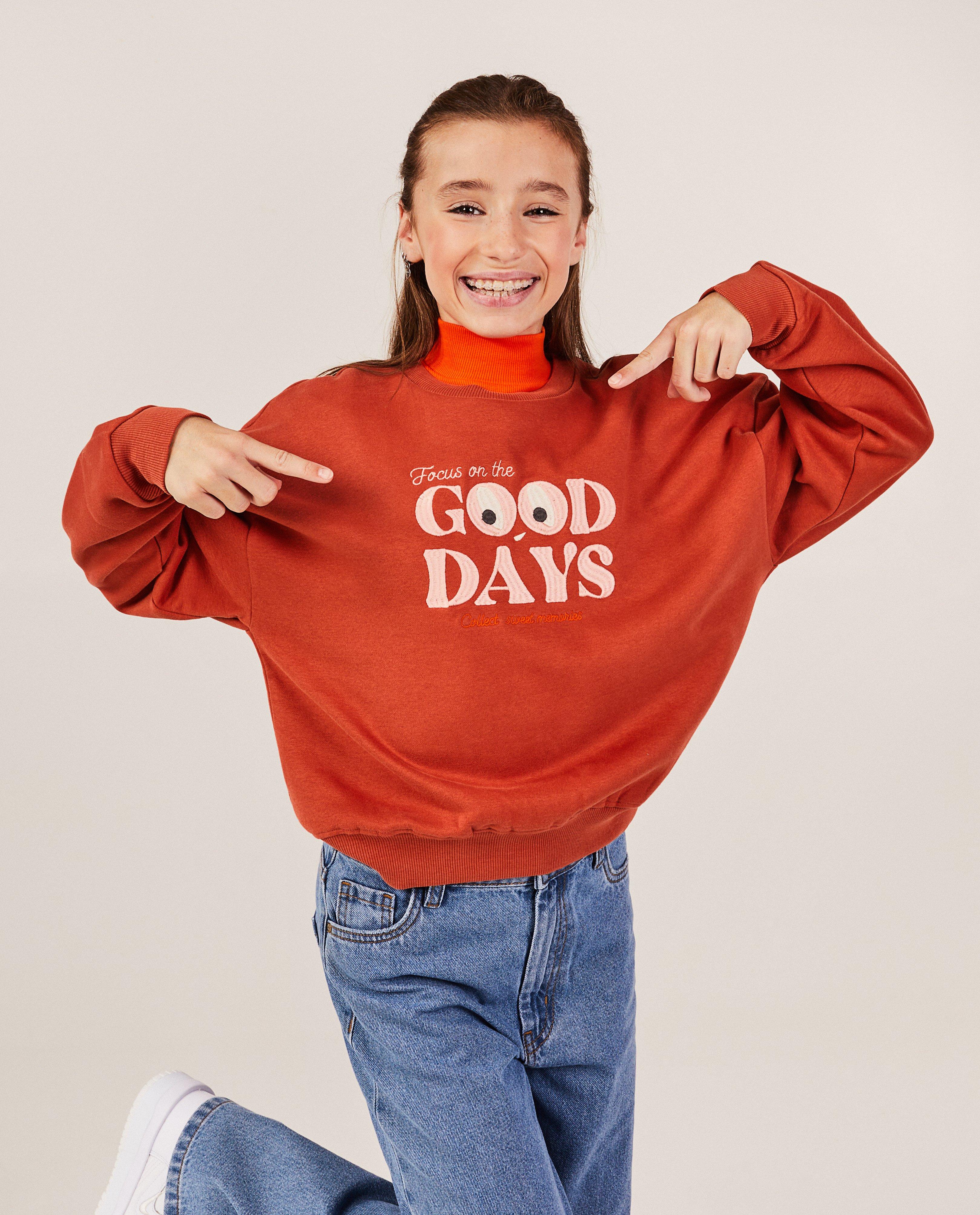 Sweaters - Oranje sweater met opschrift