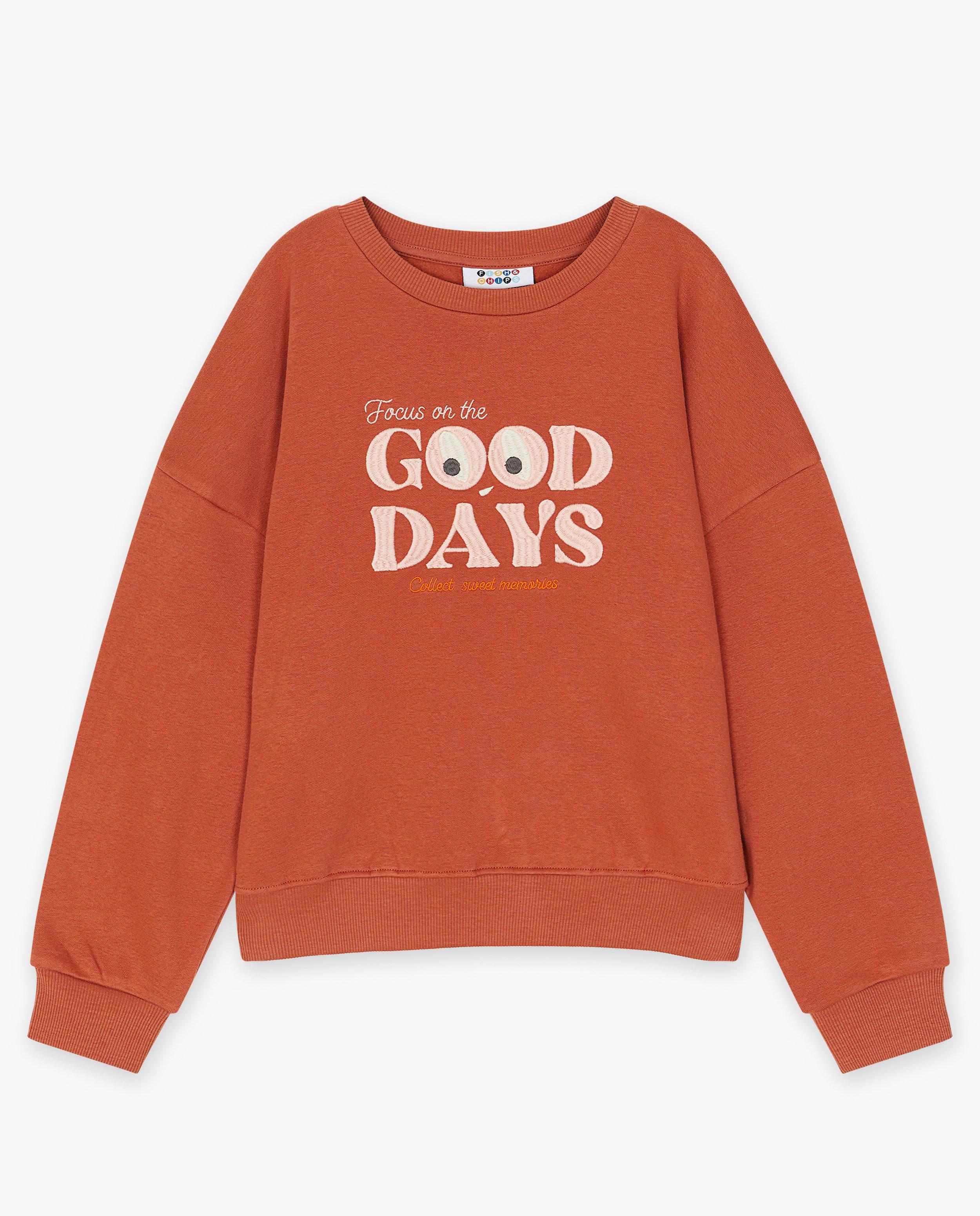 Sweaters - Oranje sweater met opschrift