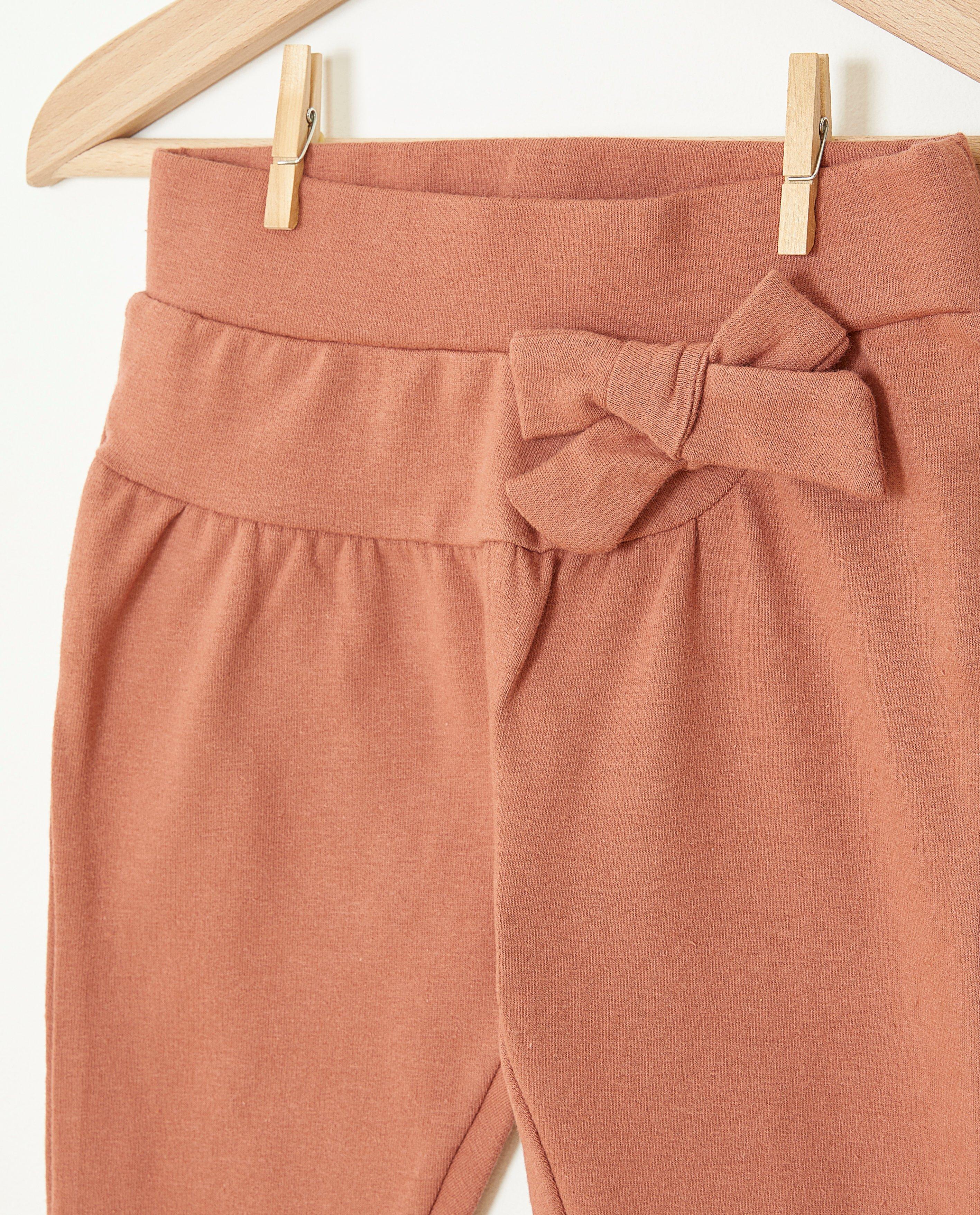Broeken - Roze broek met strik