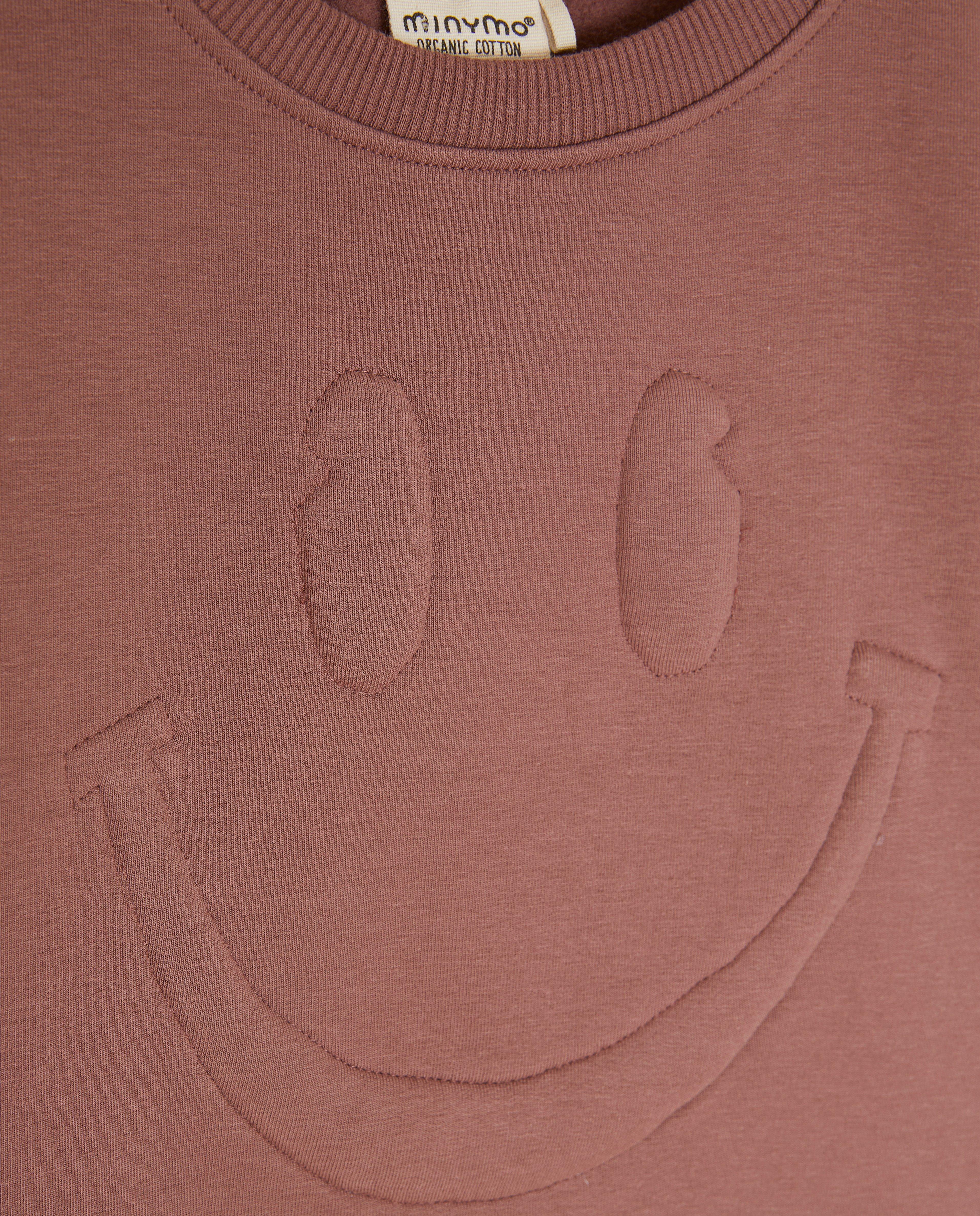 Sweaters - Donkerroze sweater met smiley