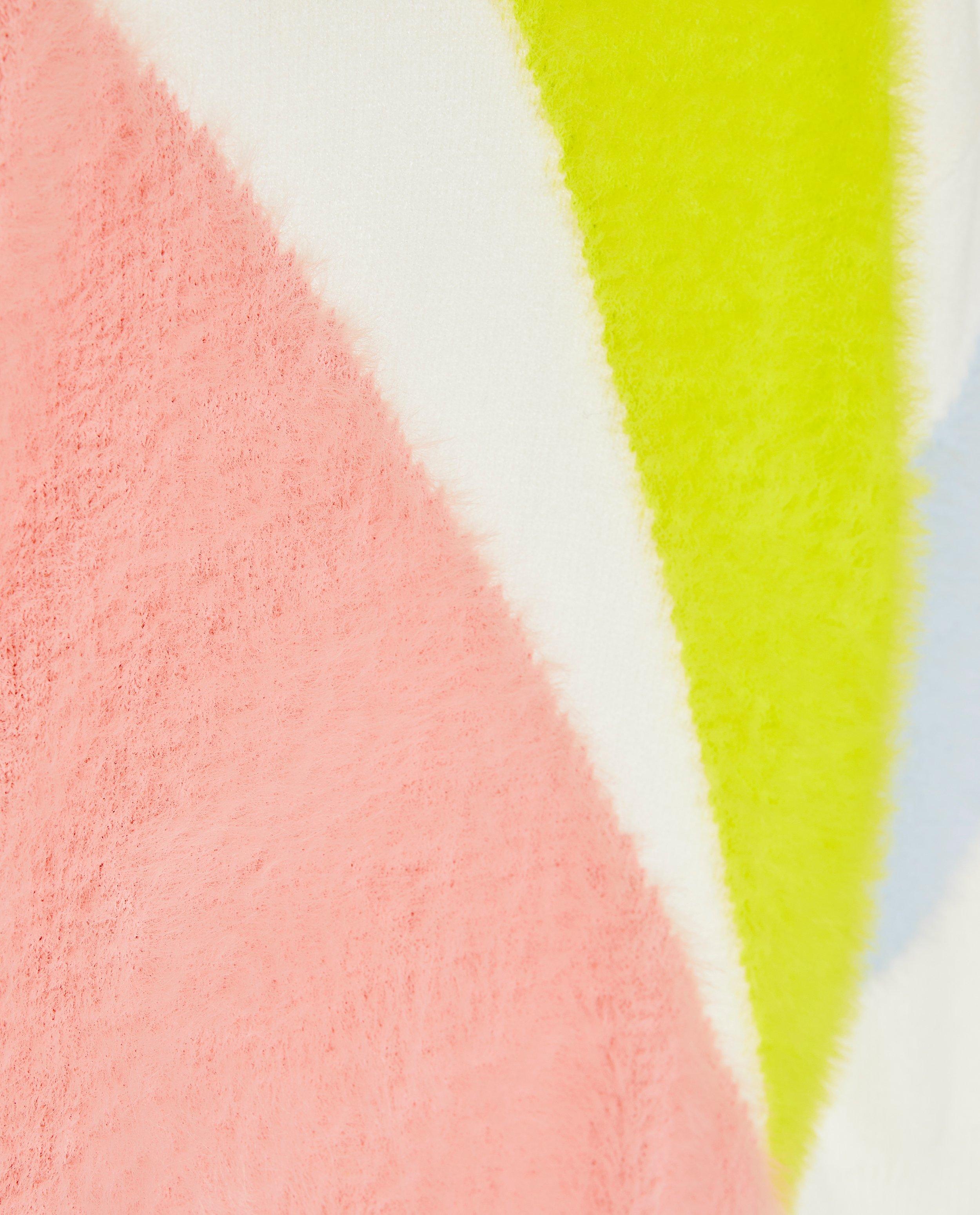 Truien - Fuzzy trui met color block, feest