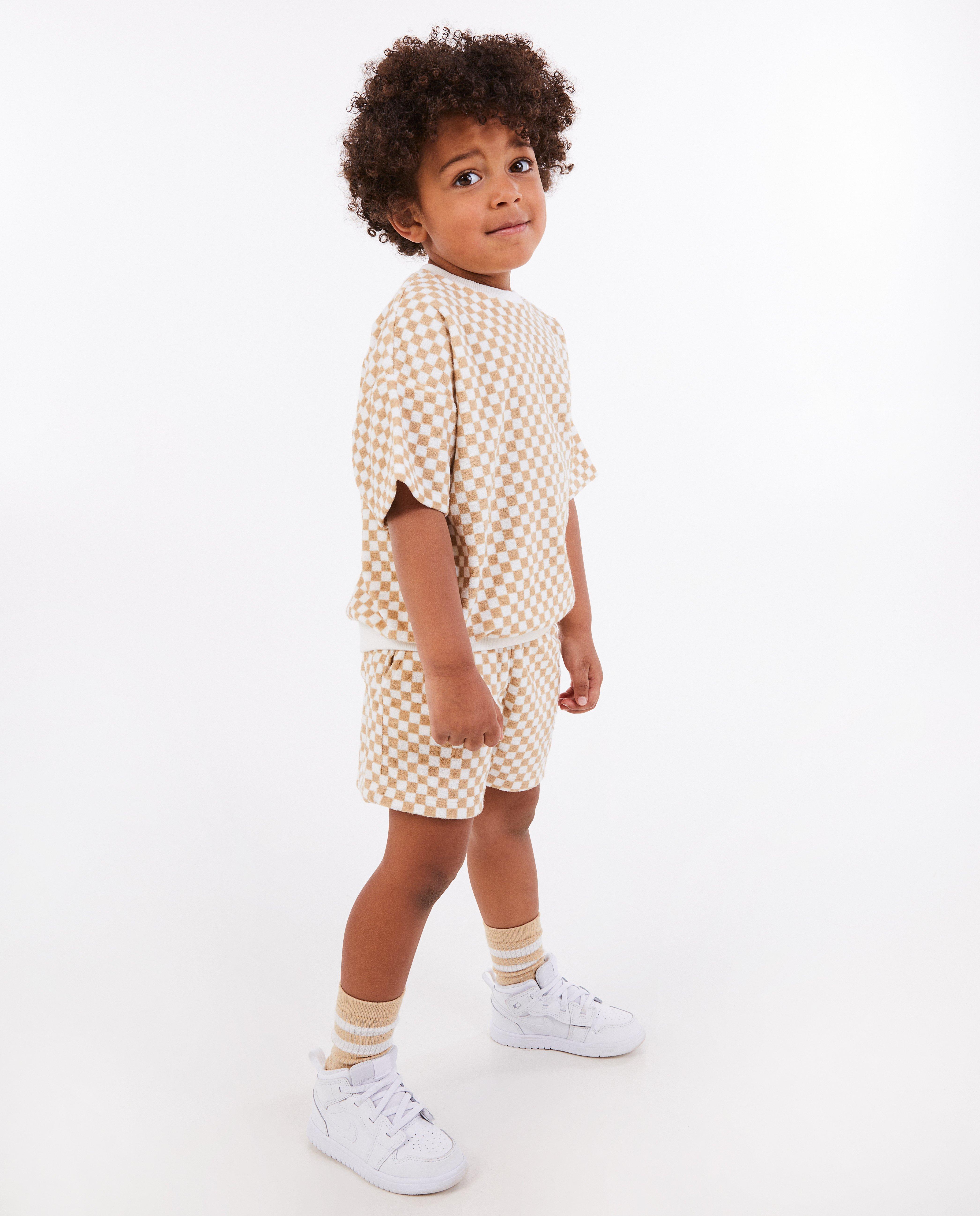 Short en éponge unisex, 3-8 ans - null - Nanja Massy