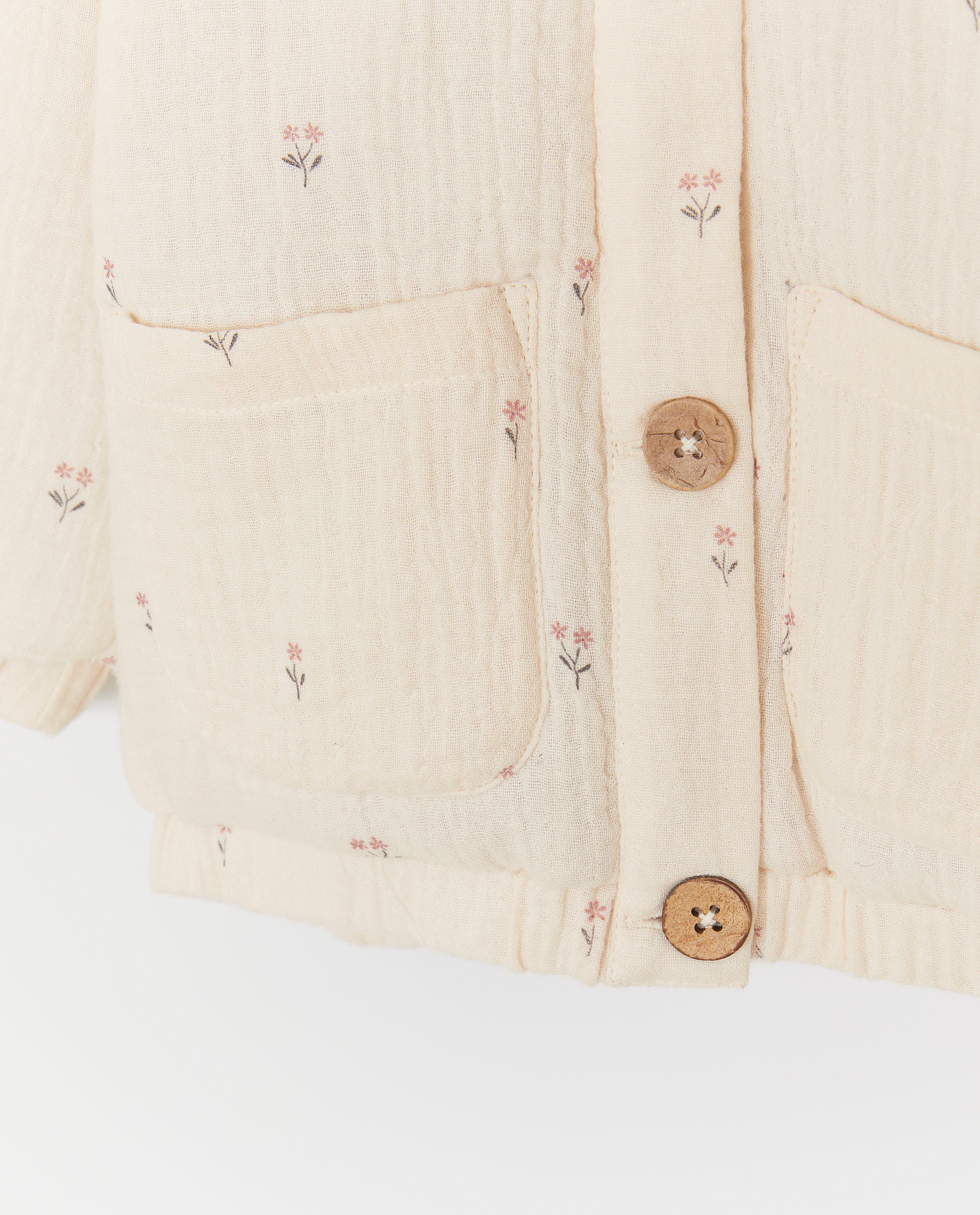 Poncho's en teddy's - Tetra jas met bloemenprint