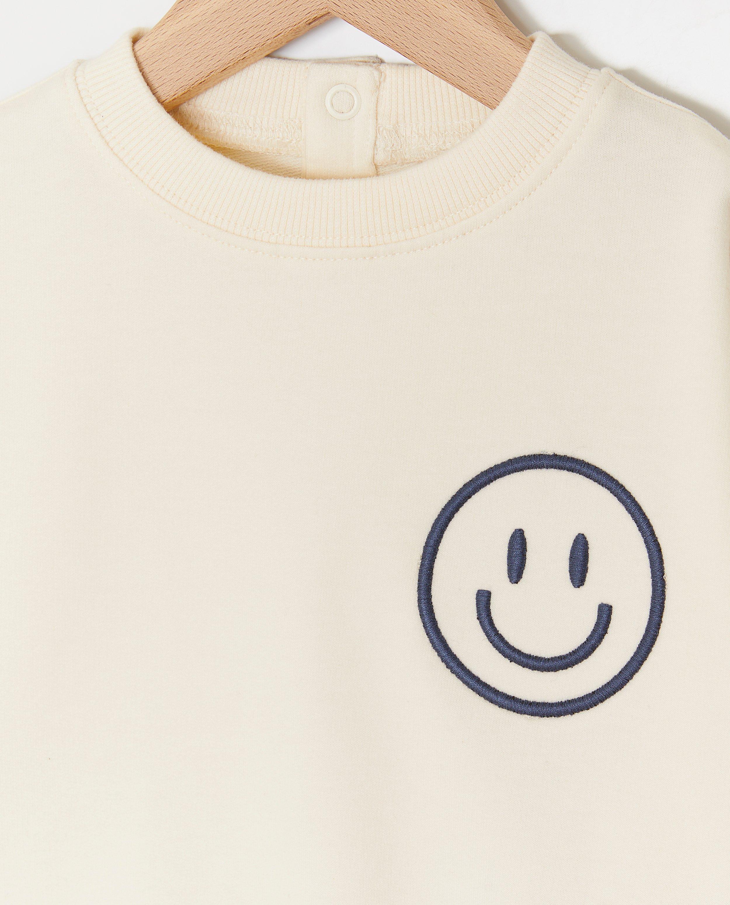 Sweaters - Sweater met geborduurde smiley