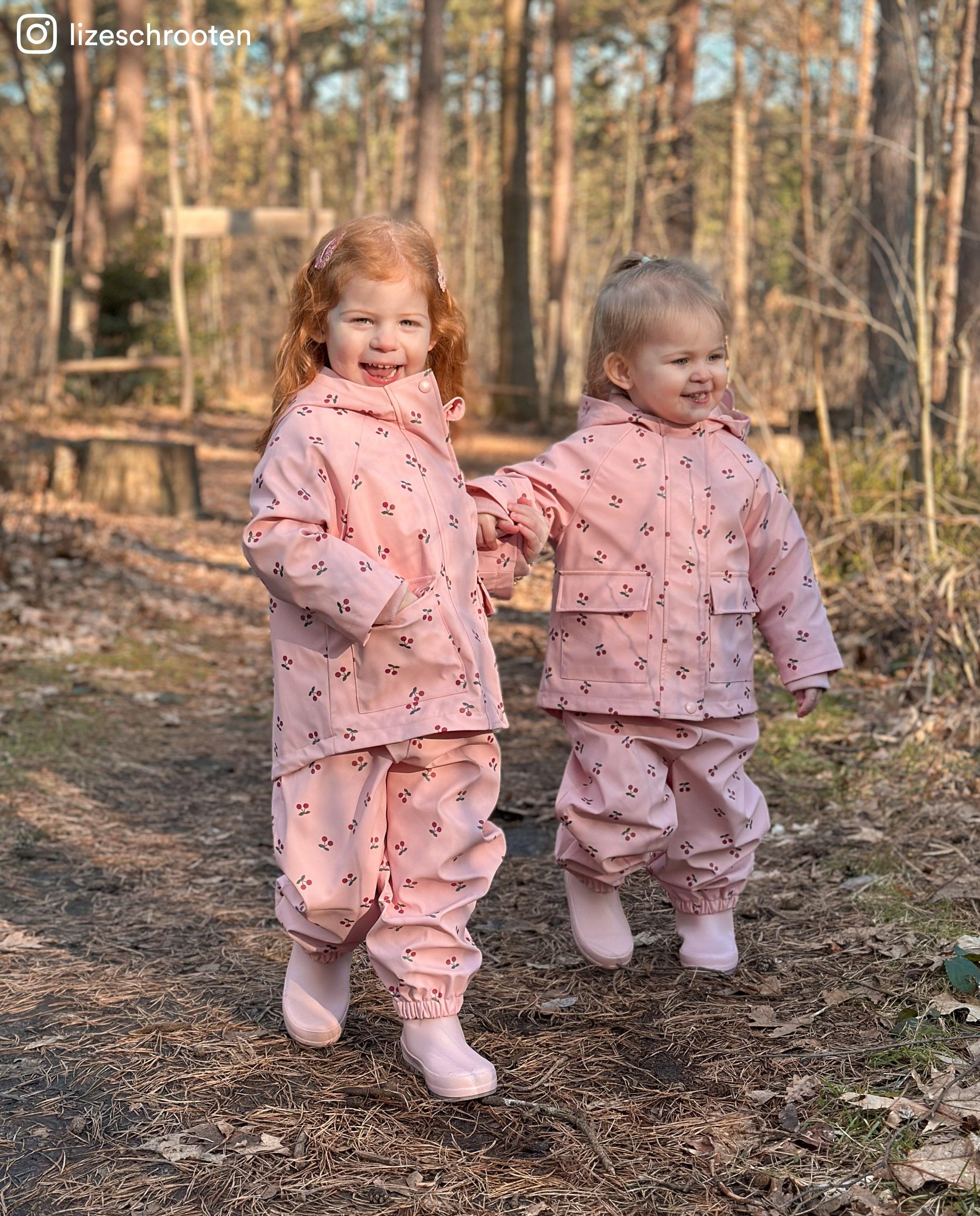 Jumpsuit - Roze regenbroek met print