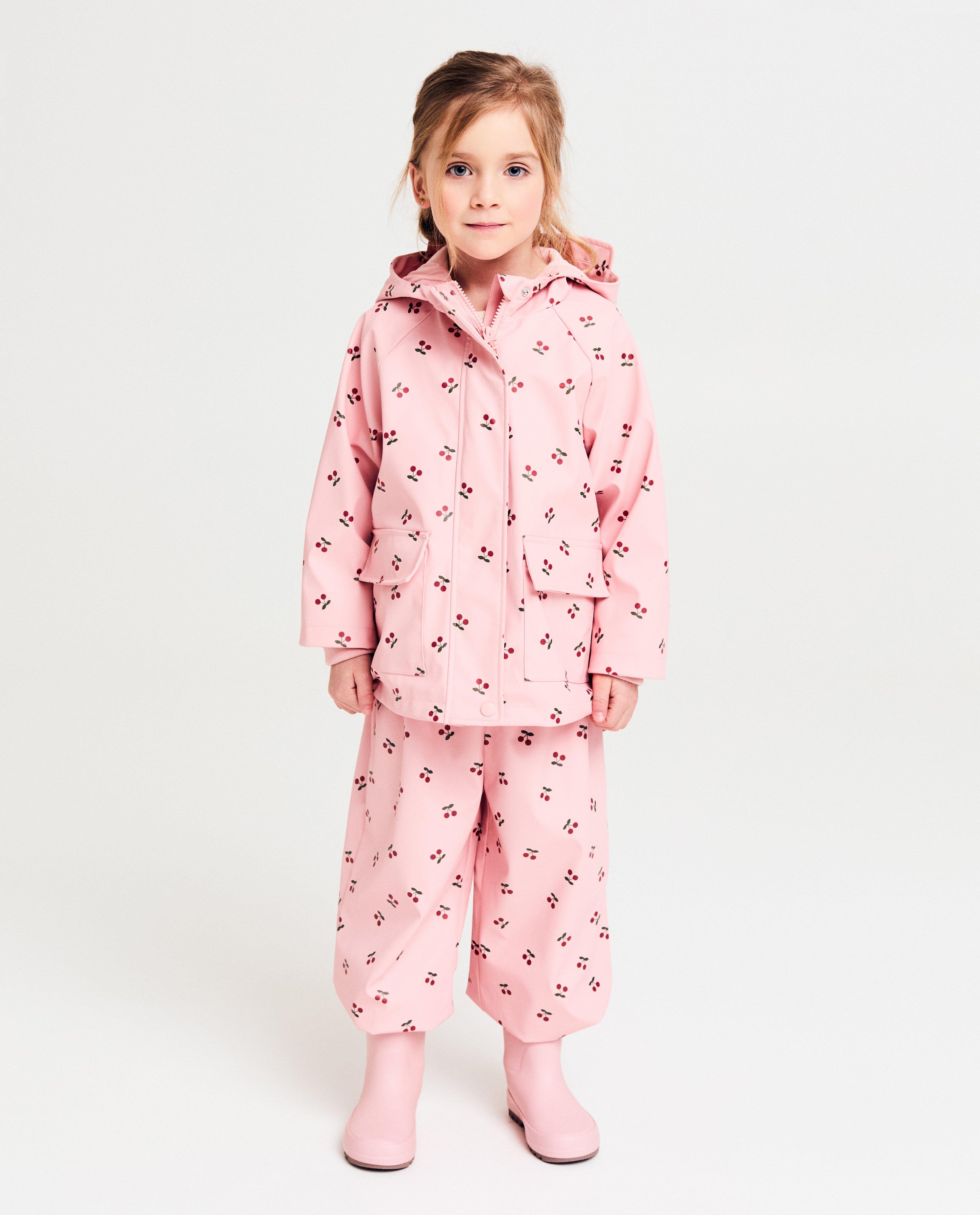 Jumpsuit - Roze regenbroek met print
