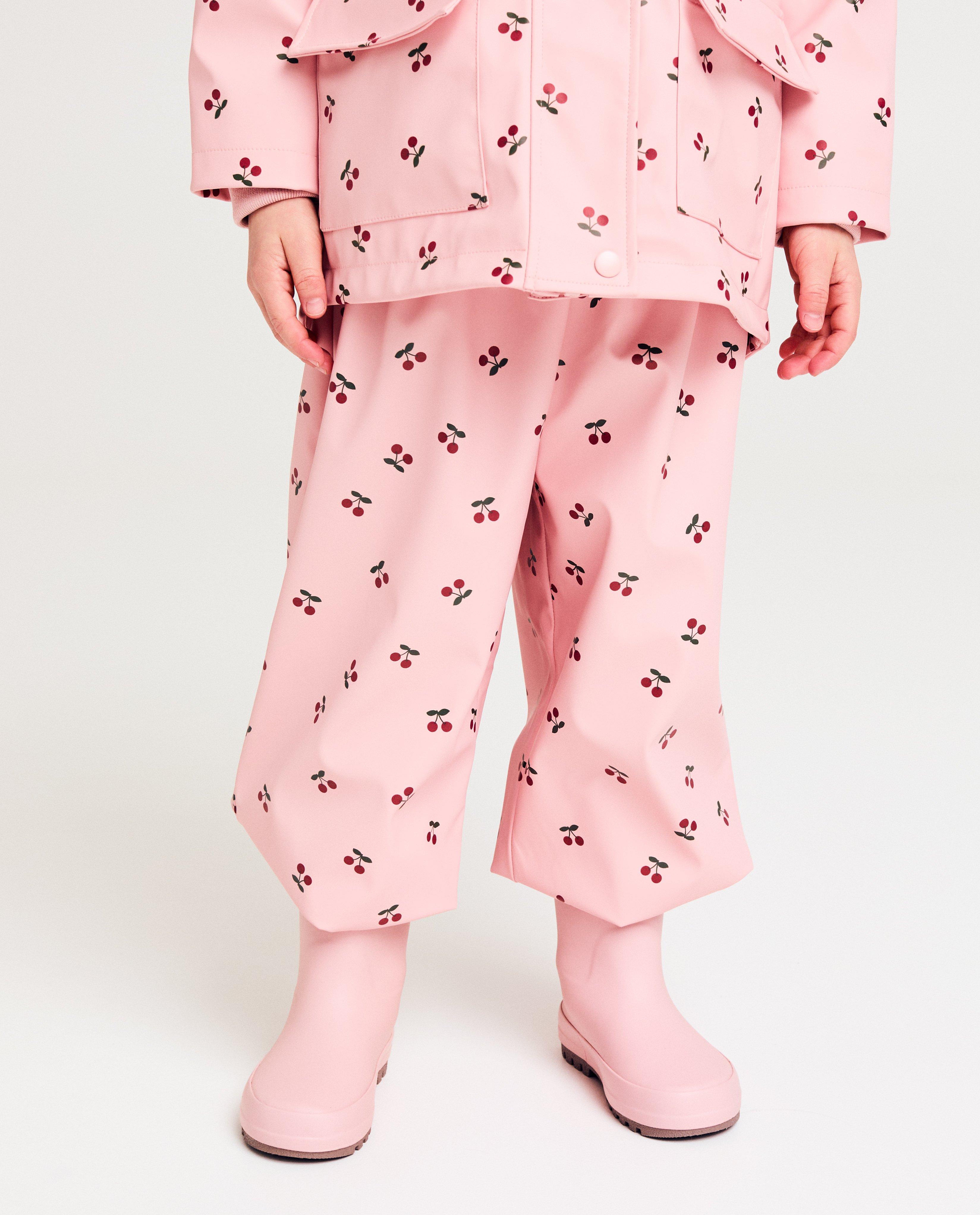 Jumpsuit - Roze regenbroek met print