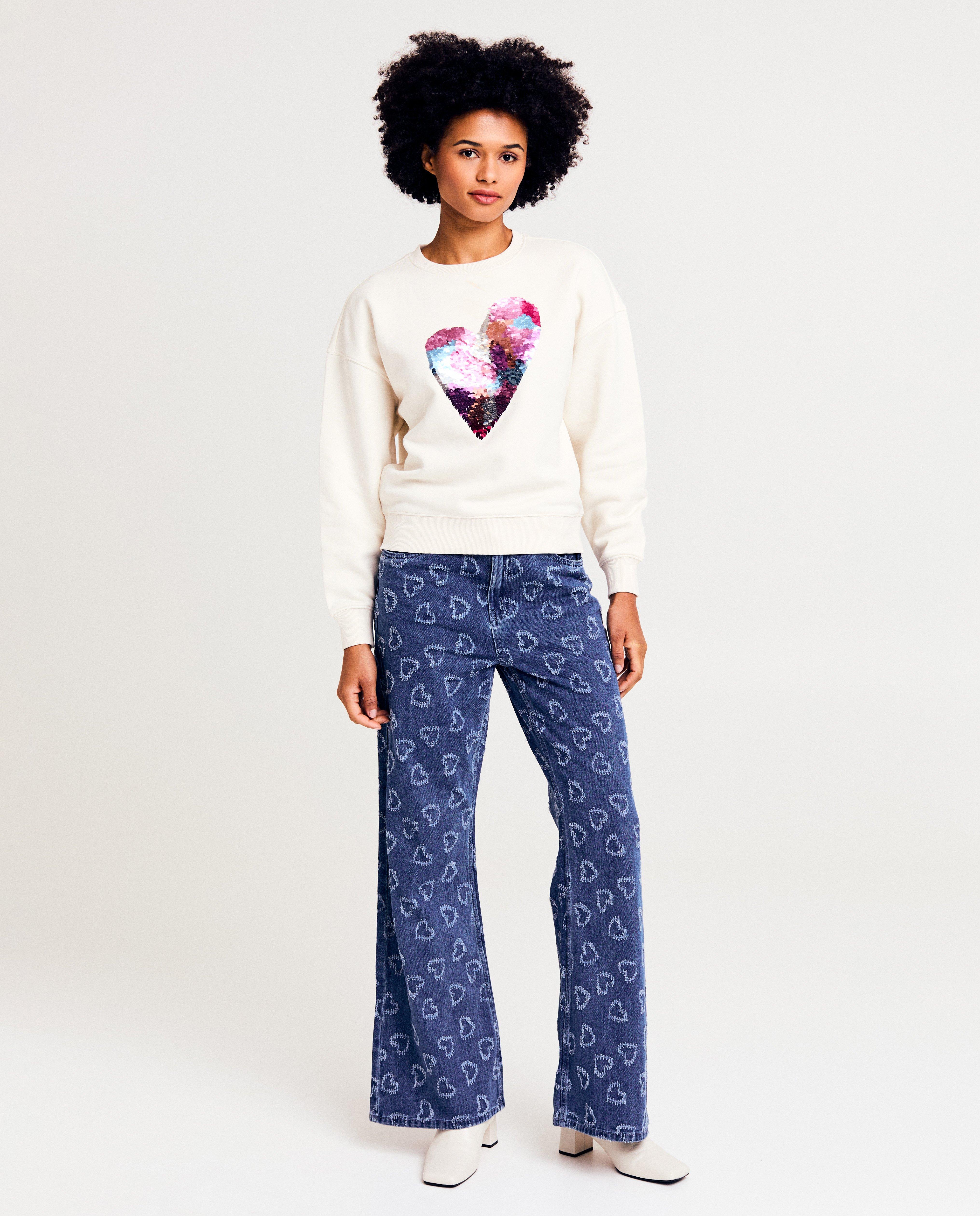 Blauwe jeans met hartjespatroon, flared fit - null - Sora