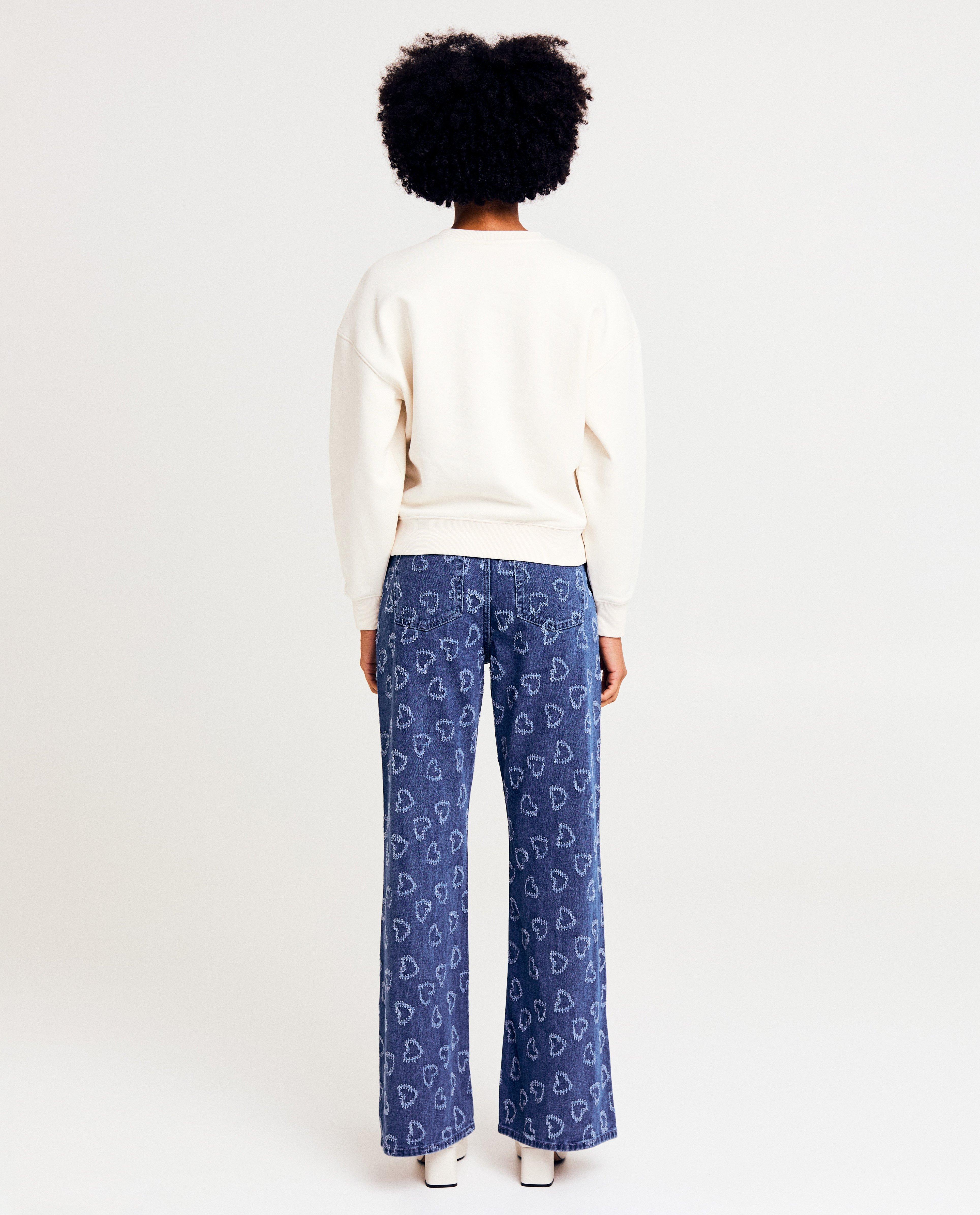 Jeans - Blauwe jeans met hartjespatroon, flared fit
