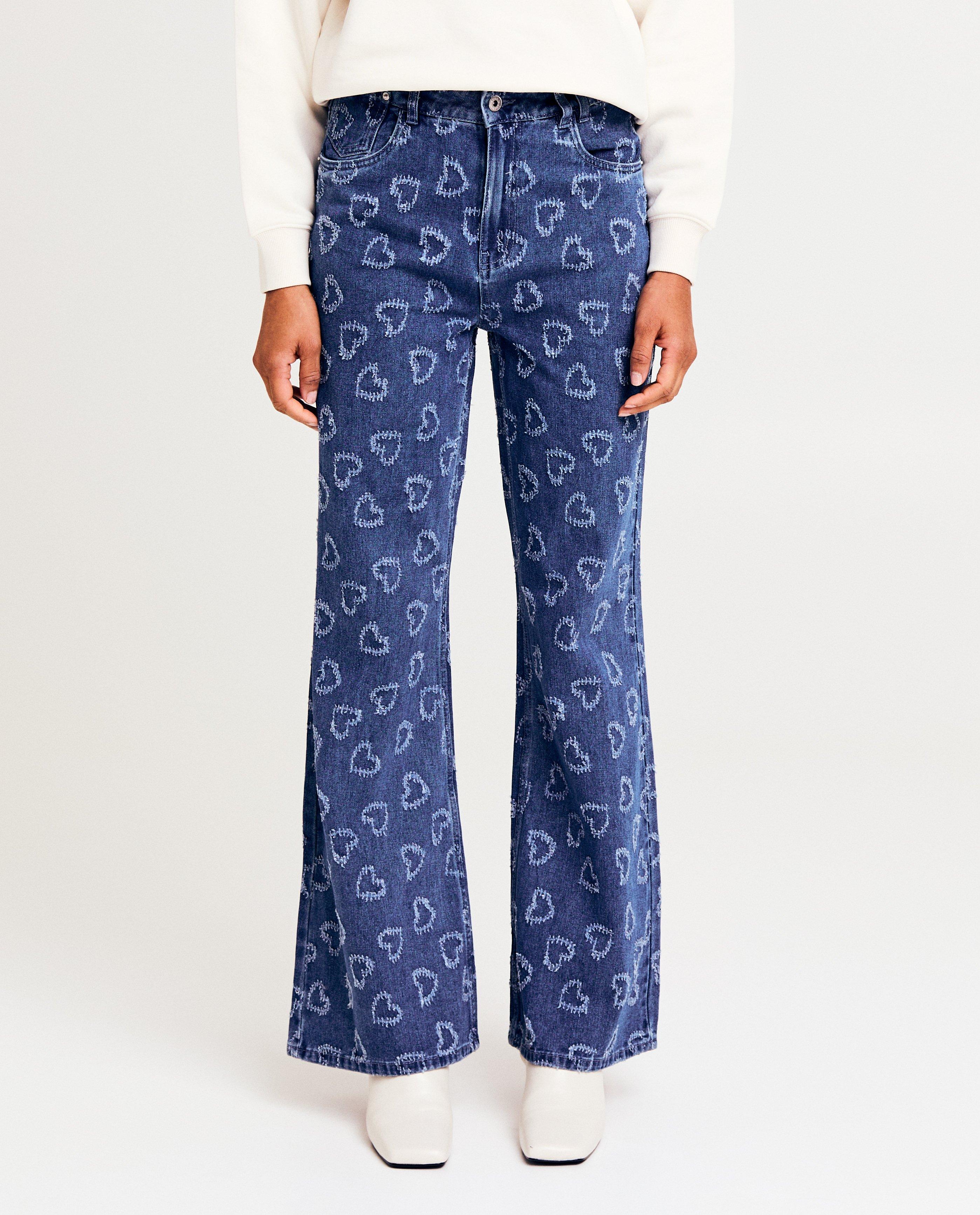 Jeans - Blauwe jeans met hartjespatroon, flared fit