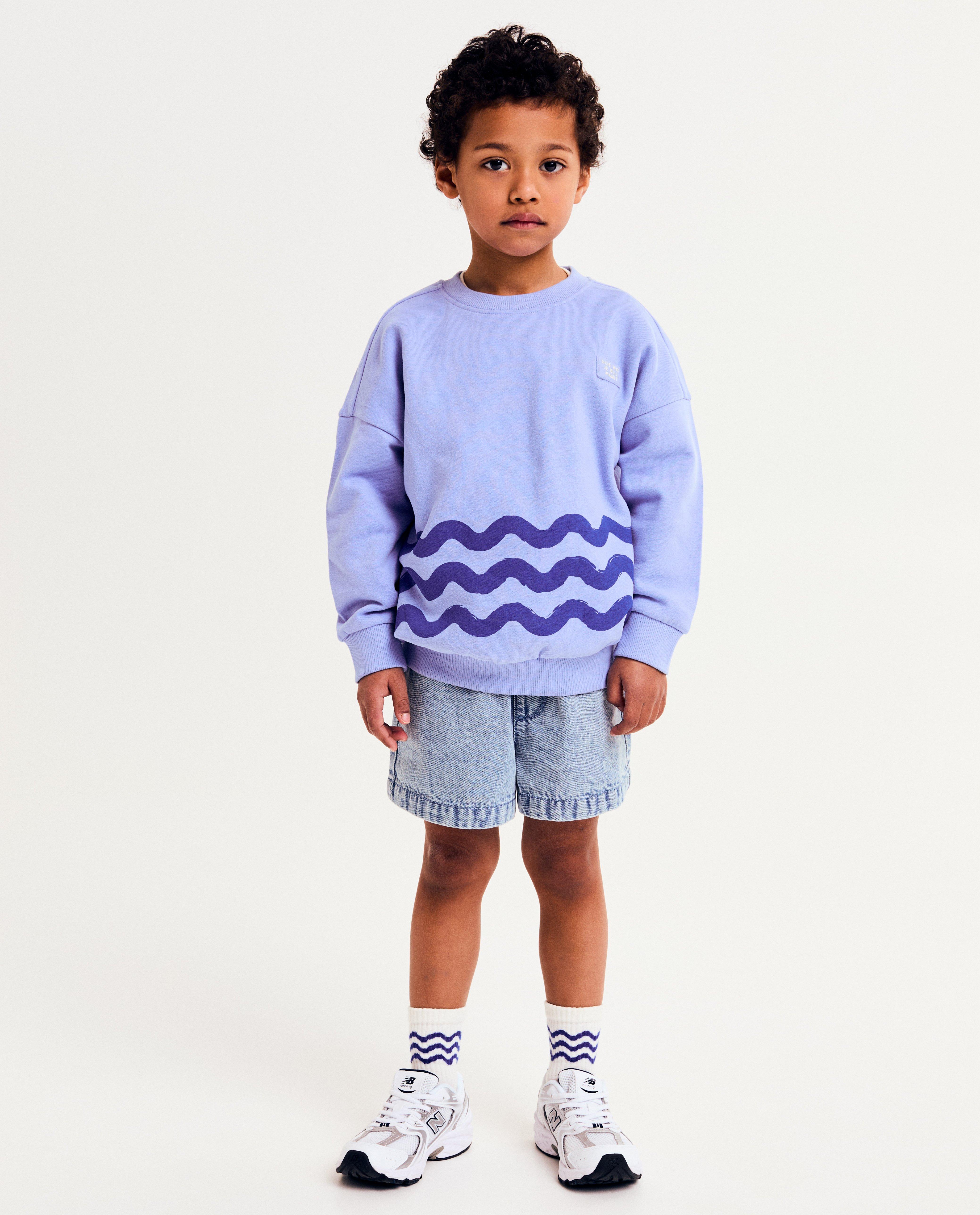 Sweaters - Sweater met golvende strepen, unisex