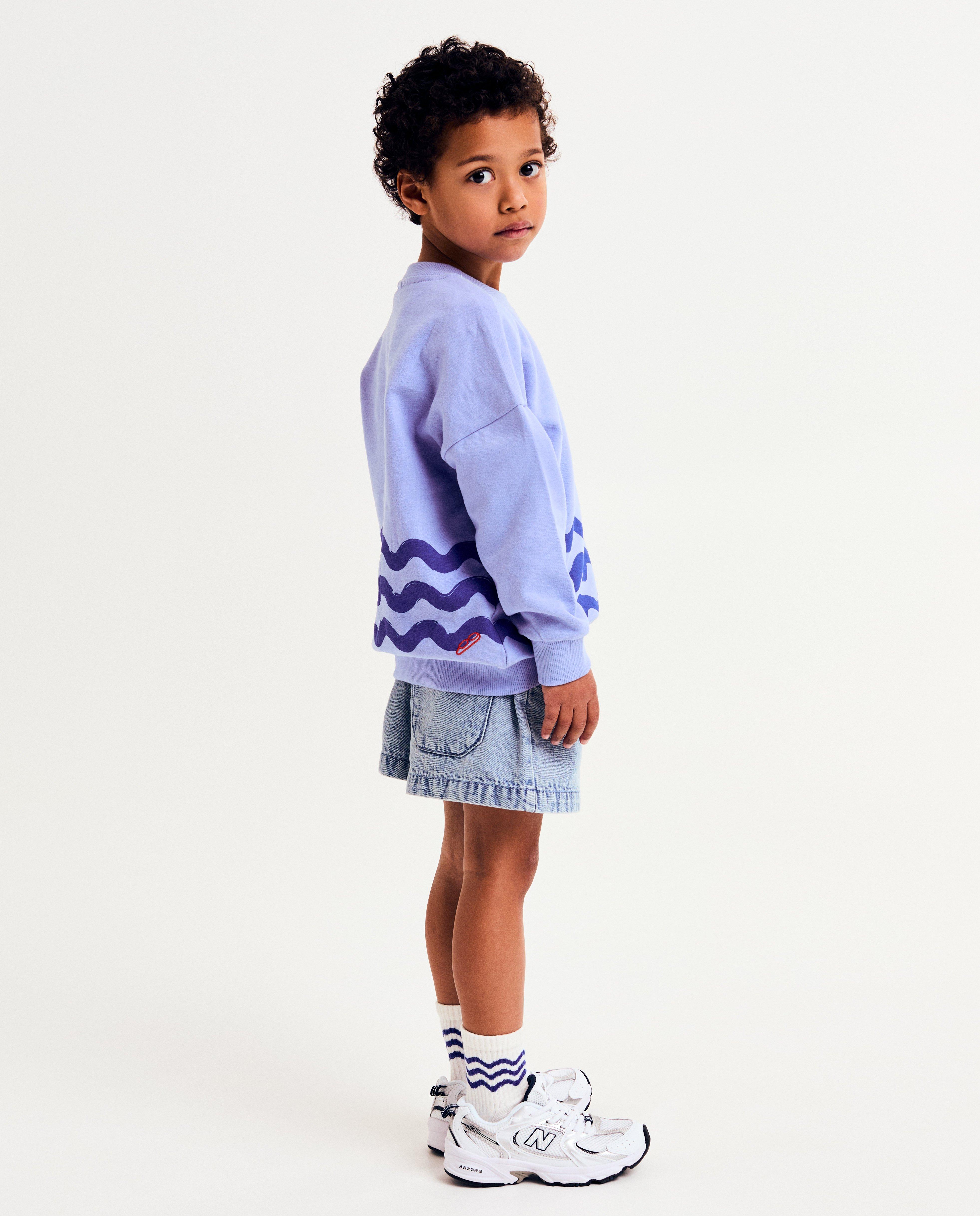 Sweaters - Sweater met golvende strepen, unisex