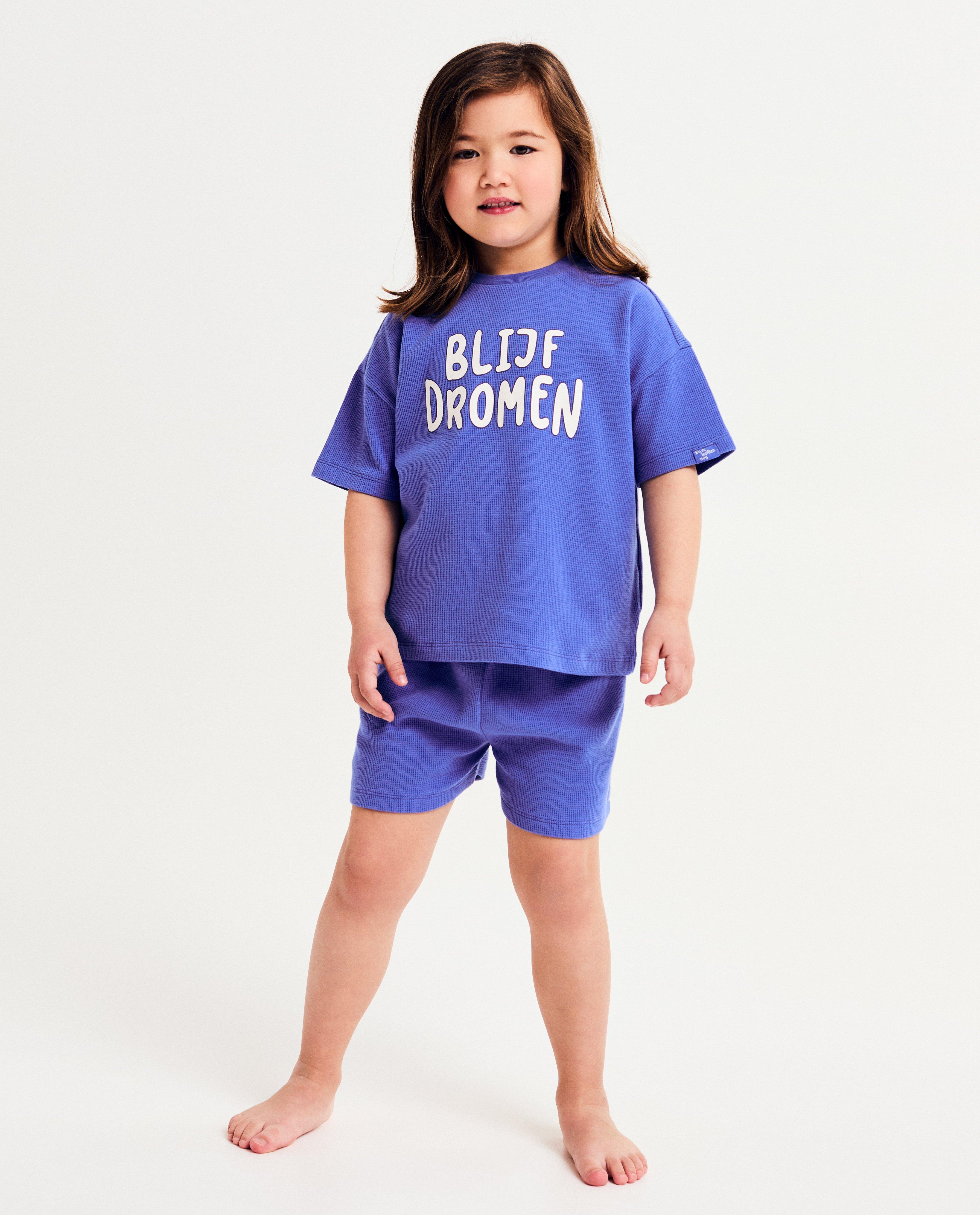 Pyjama met opschrift Blijf dromen, unisex