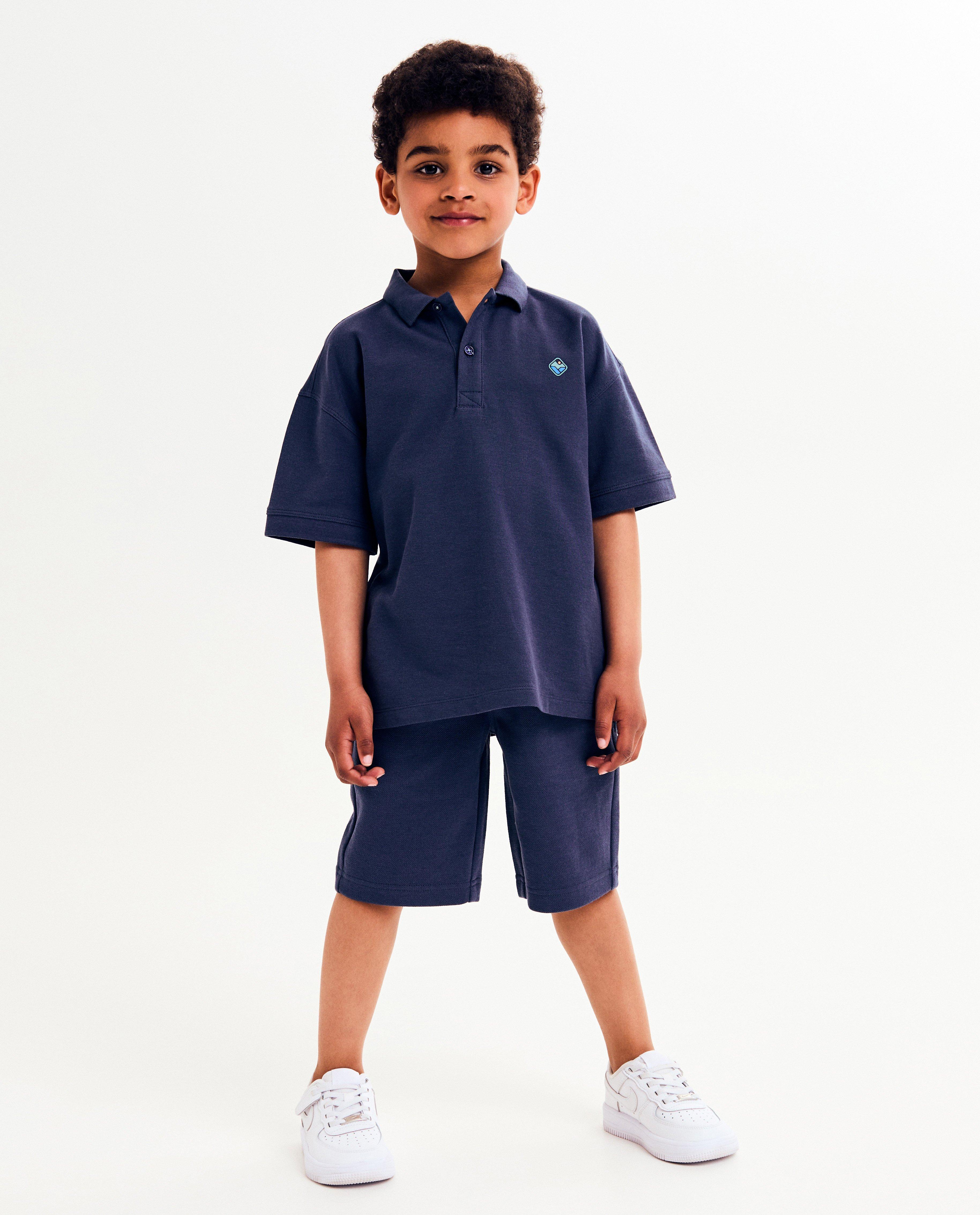 Polo's - Polo met kleine reliëfprint, loose fit