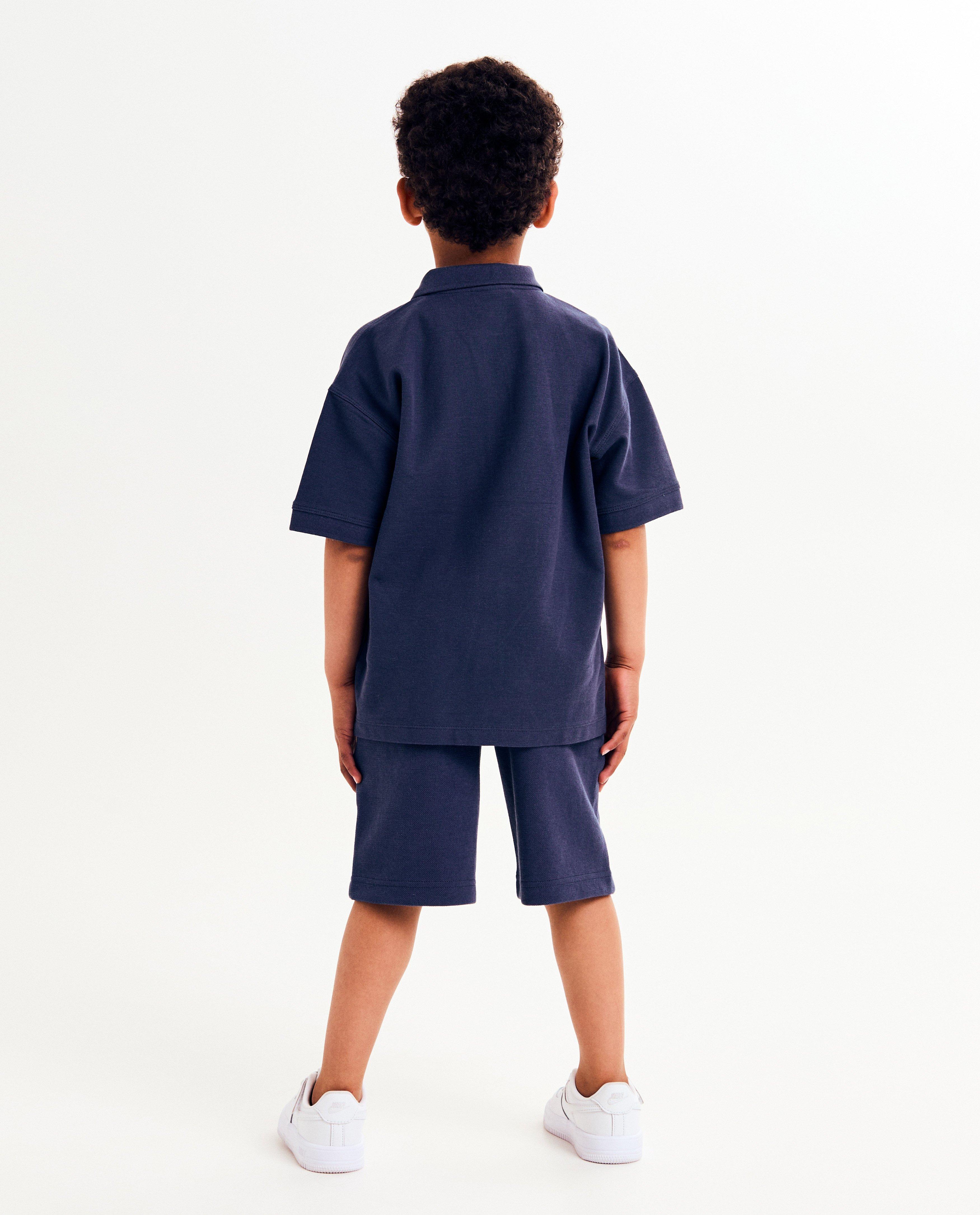 Polo's - Polo met kleine reliëfprint, loose fit
