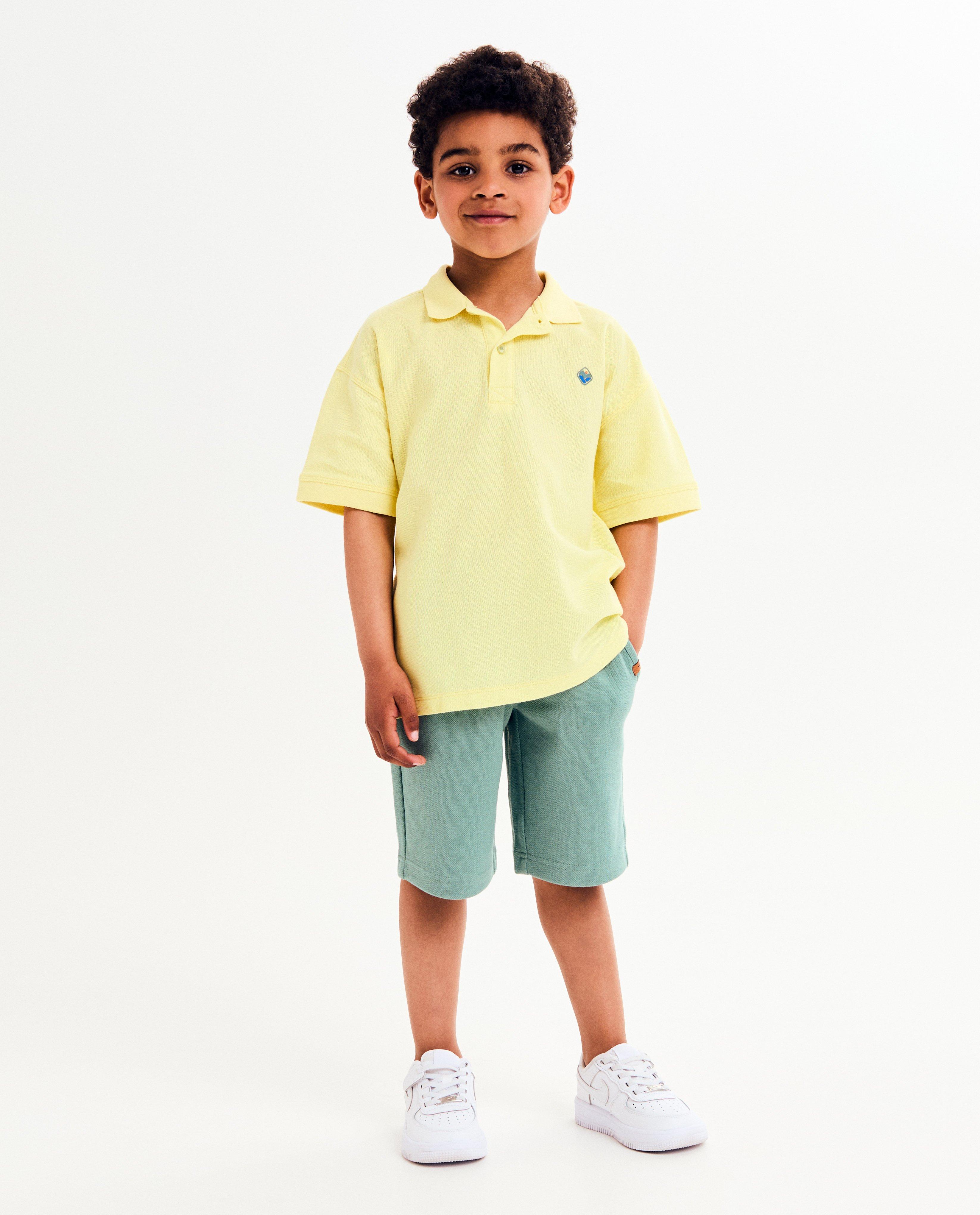 Polo's - Polo met kleine reliëfprint, loose fit