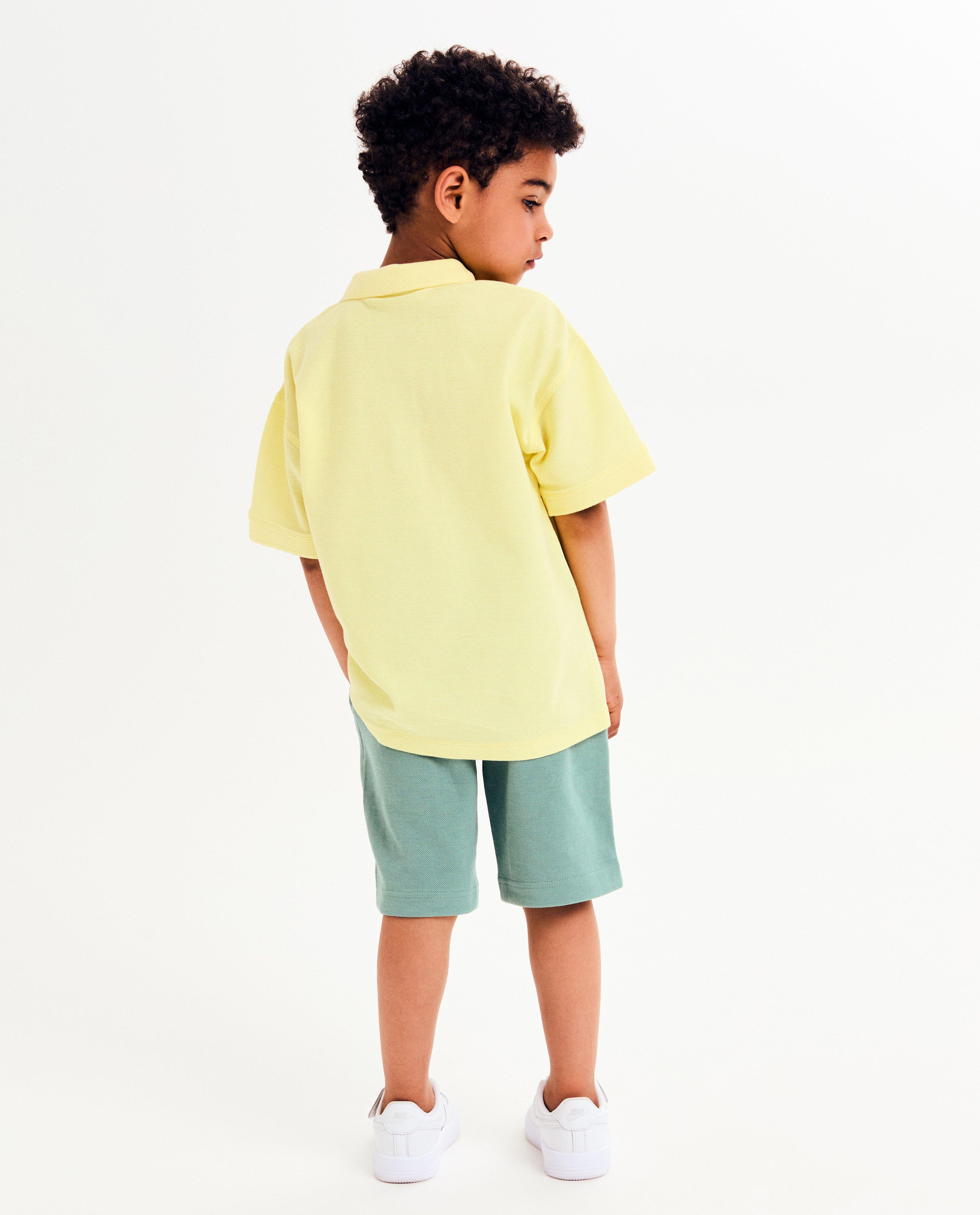 Polo's - Polo met kleine reliëfprint, loose fit