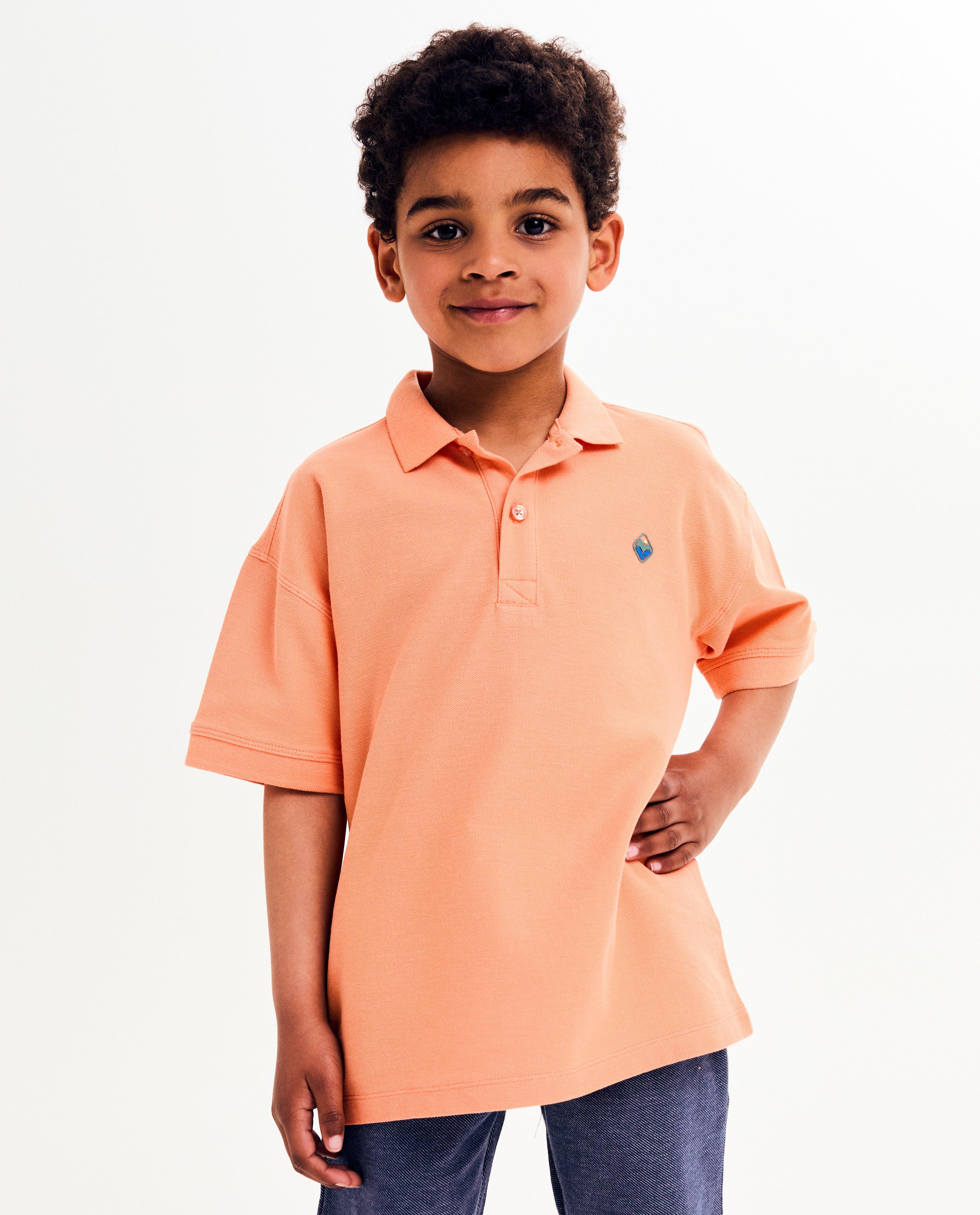 Polo met kleine reliëfprint, loose fit - null - Kidz Nation