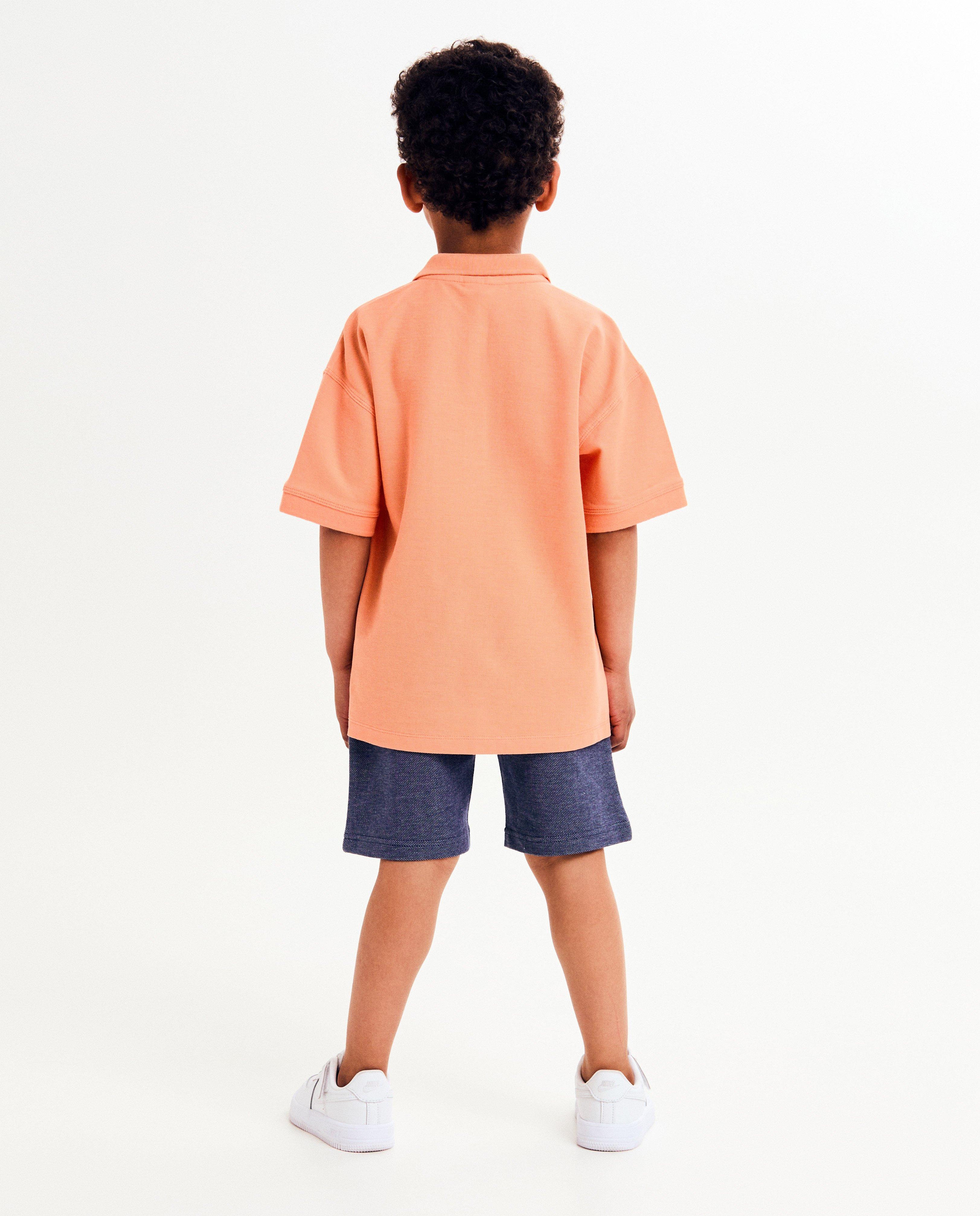 Polo's - Polo met kleine reliëfprint, loose fit