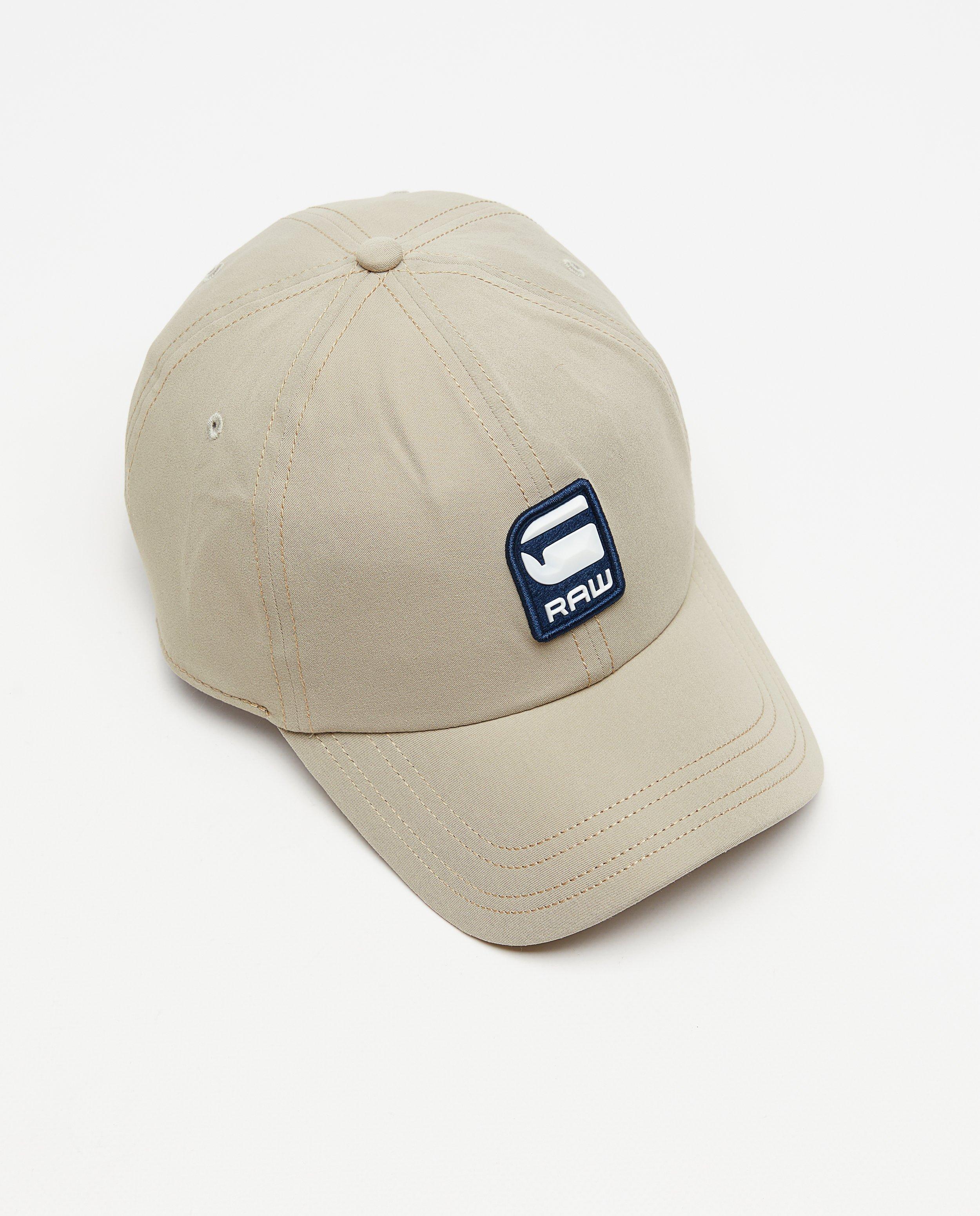 Breigoed - Beige pet met patch