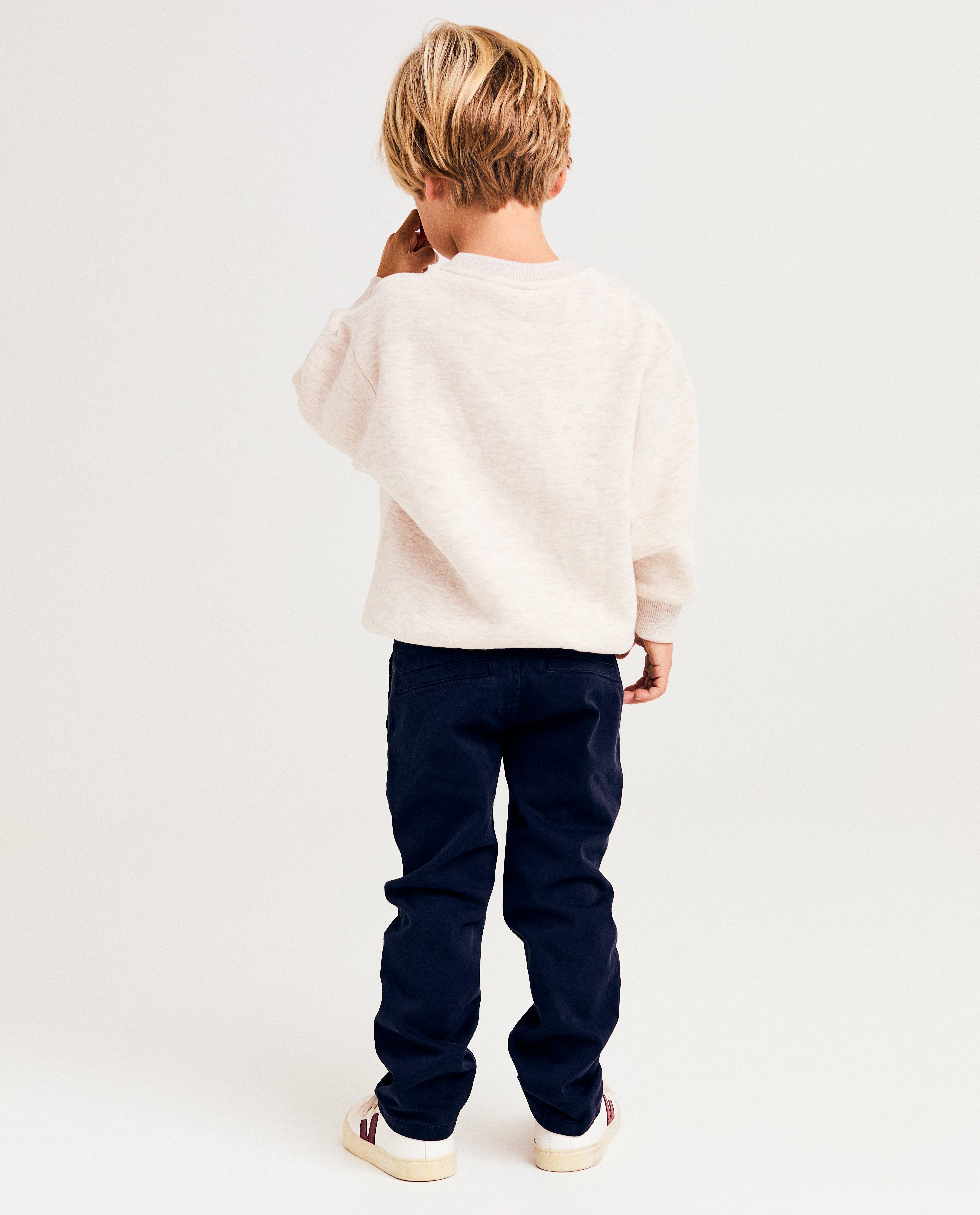 Sweaters - Sweater met smiley van bouclé