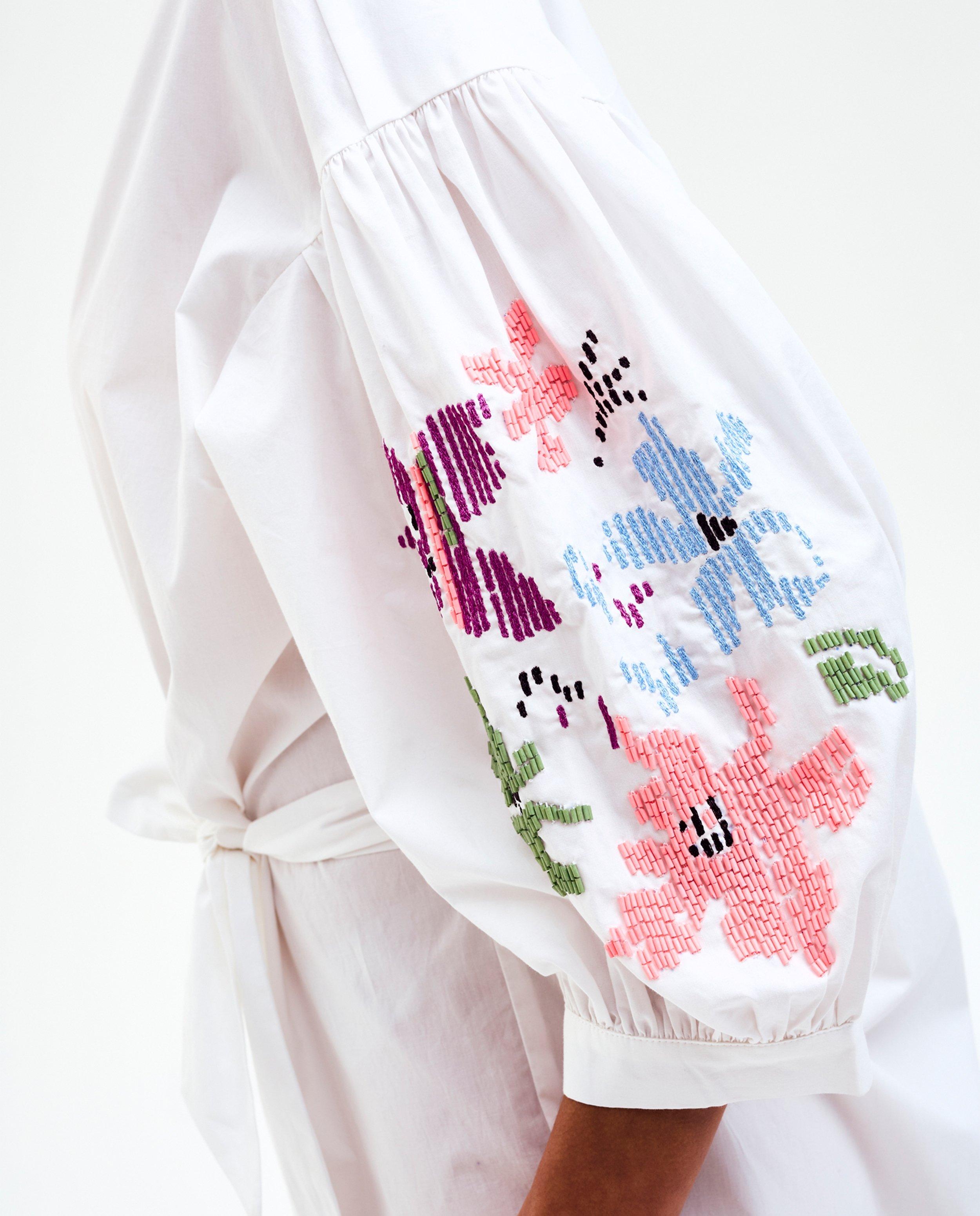 Kleedjes - Jurk met bloemen van parels