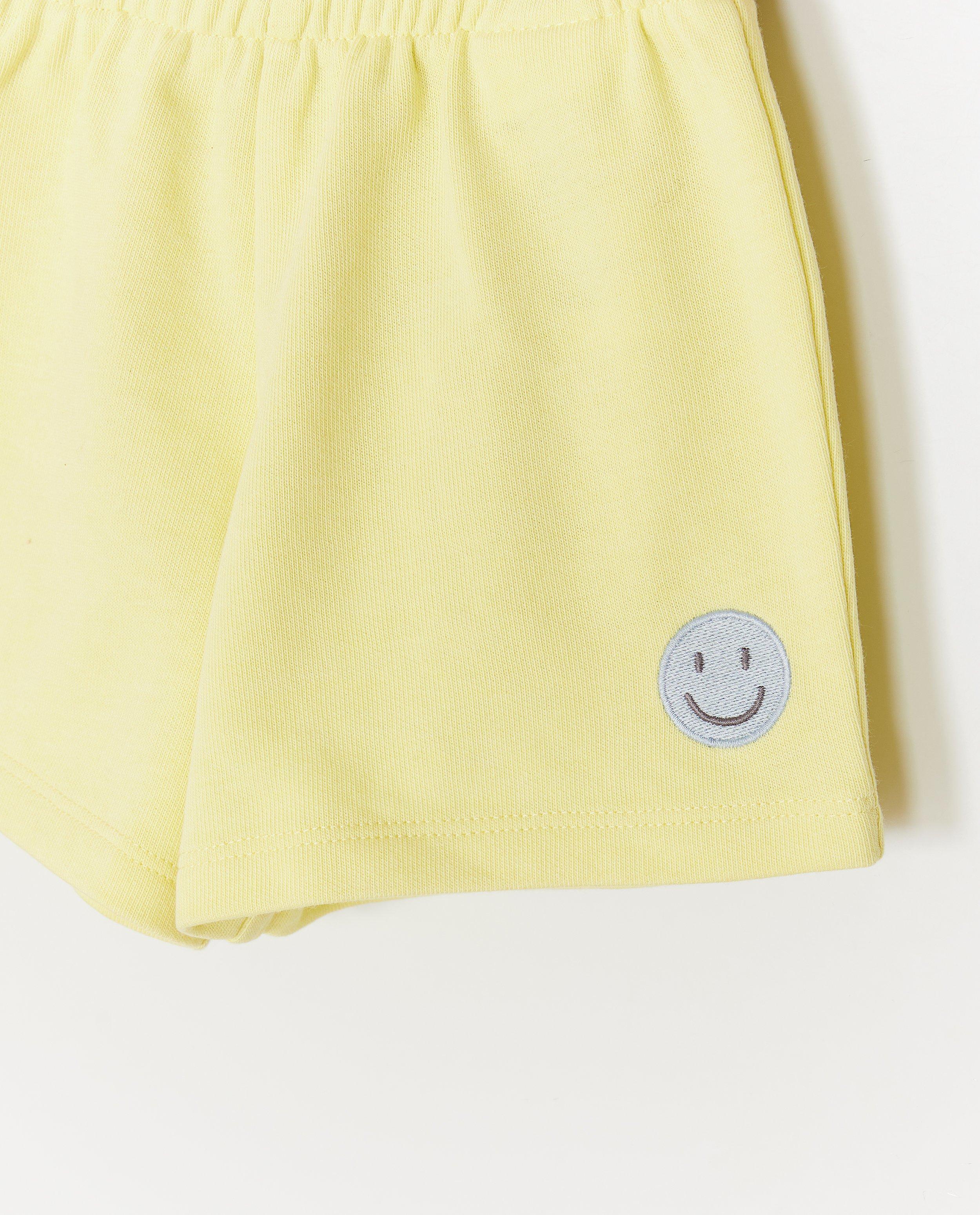 Shorts - Short avec smiley brodé