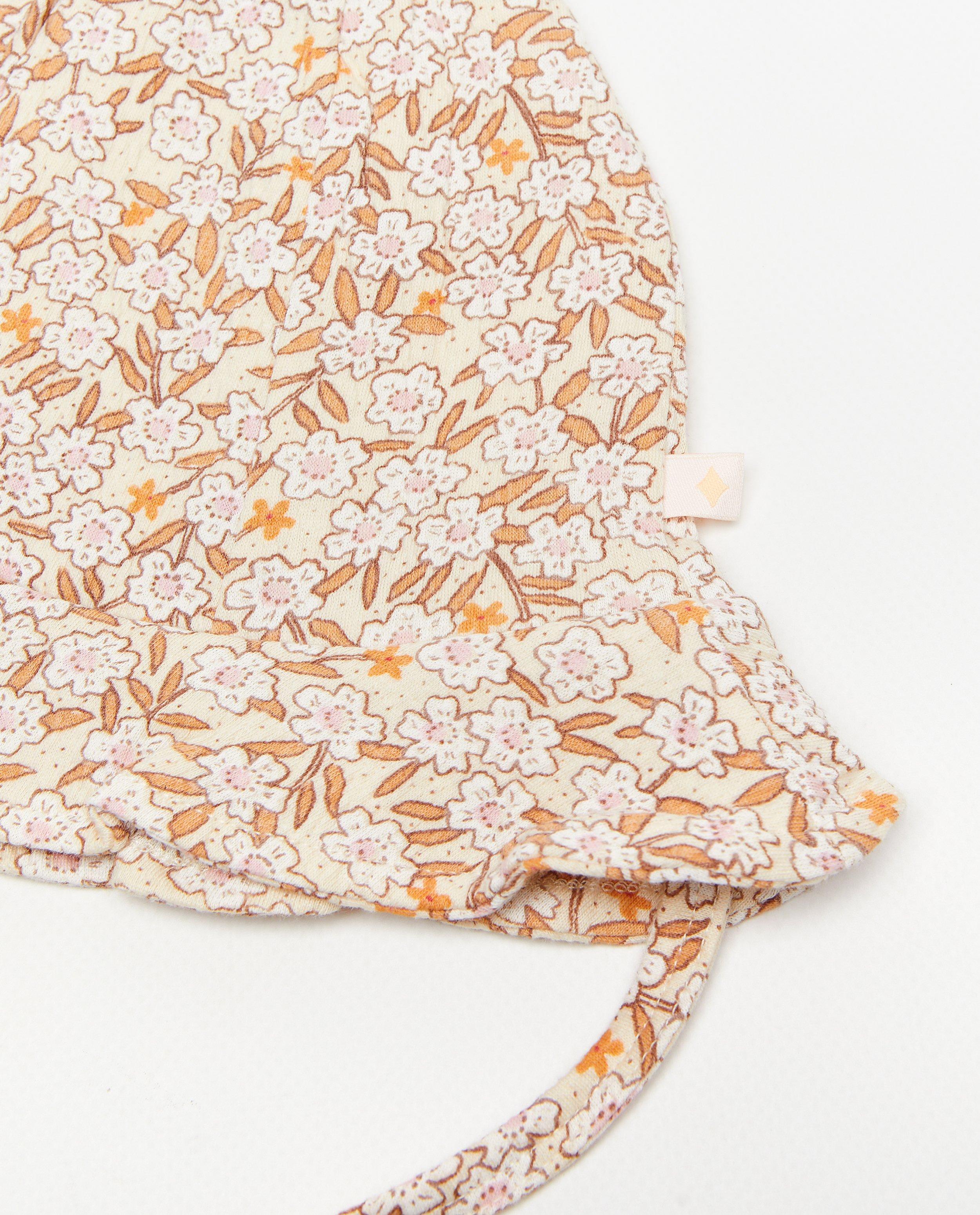 Breigoed - Zonnehoedje met bloemenprint