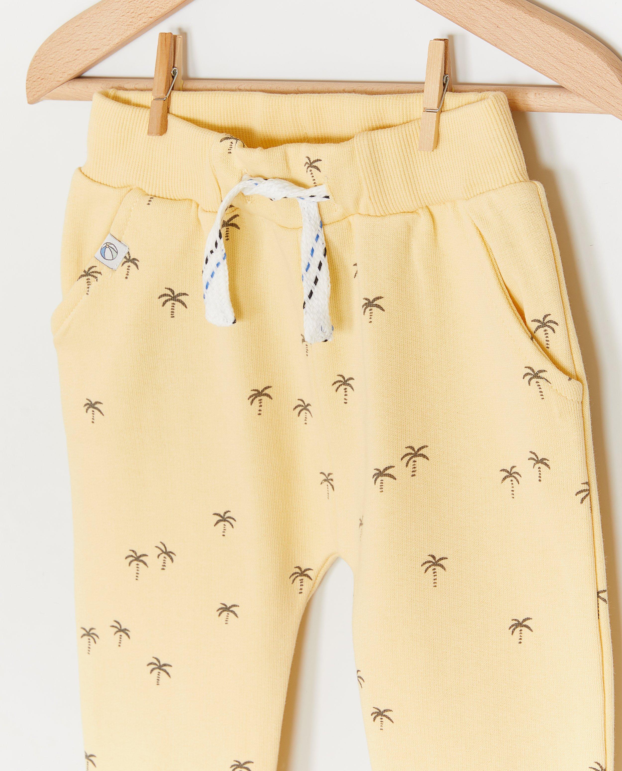 Broeken - Joggingbroek met print palmbomen