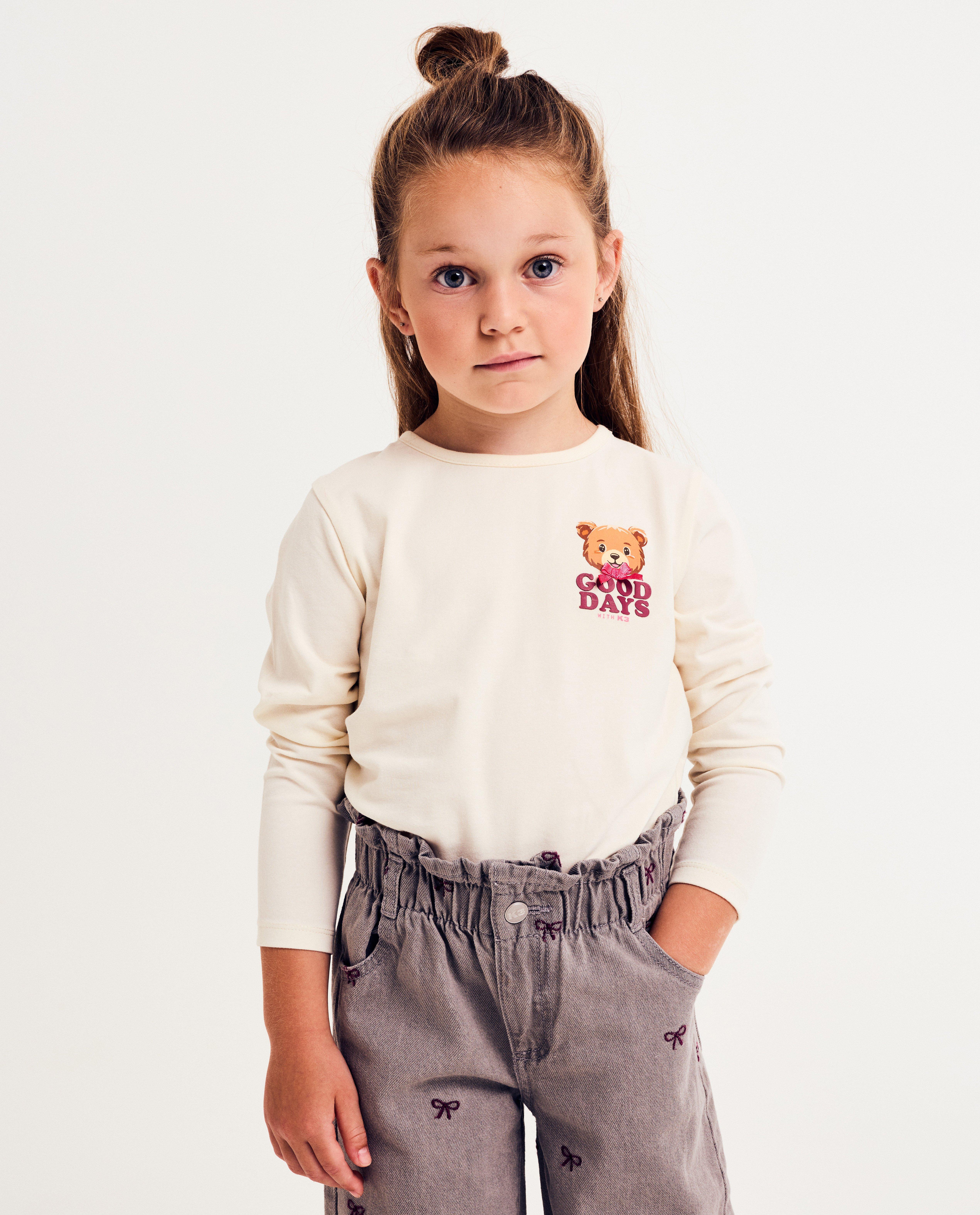 Gilet zippé avec petit nœud