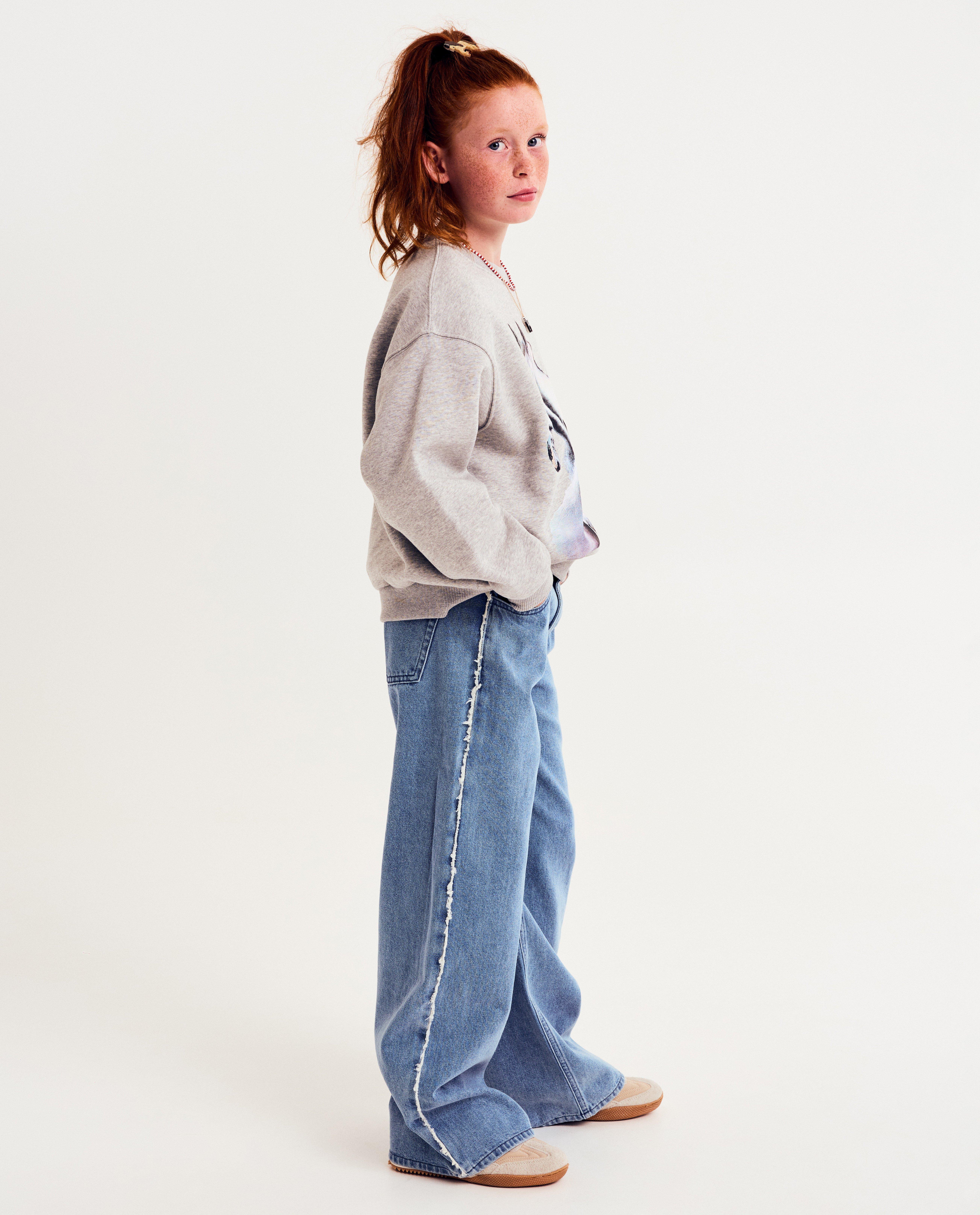 Blauwe jeans met franjes, wide fit