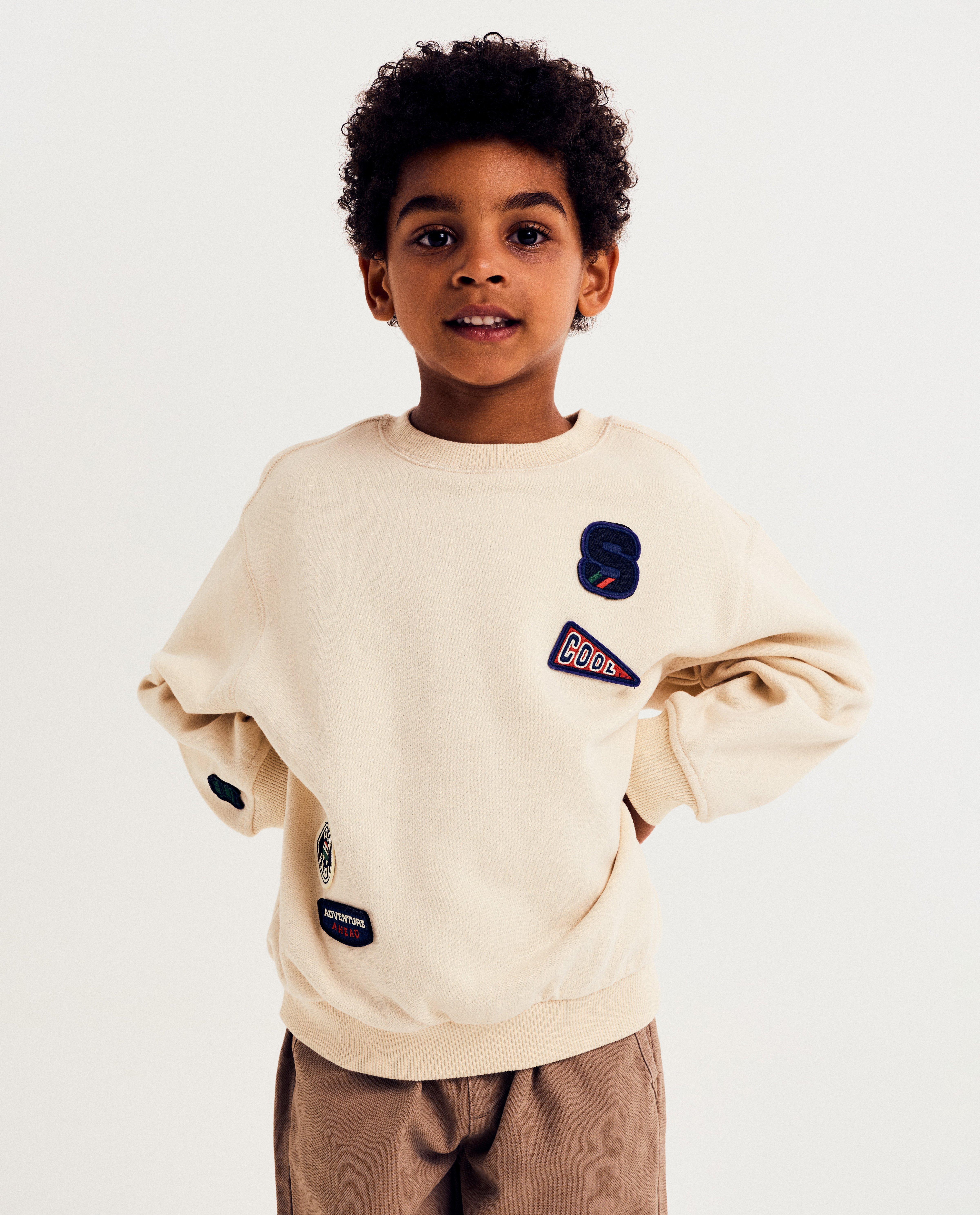 Sweatshirt avec patchs brodés