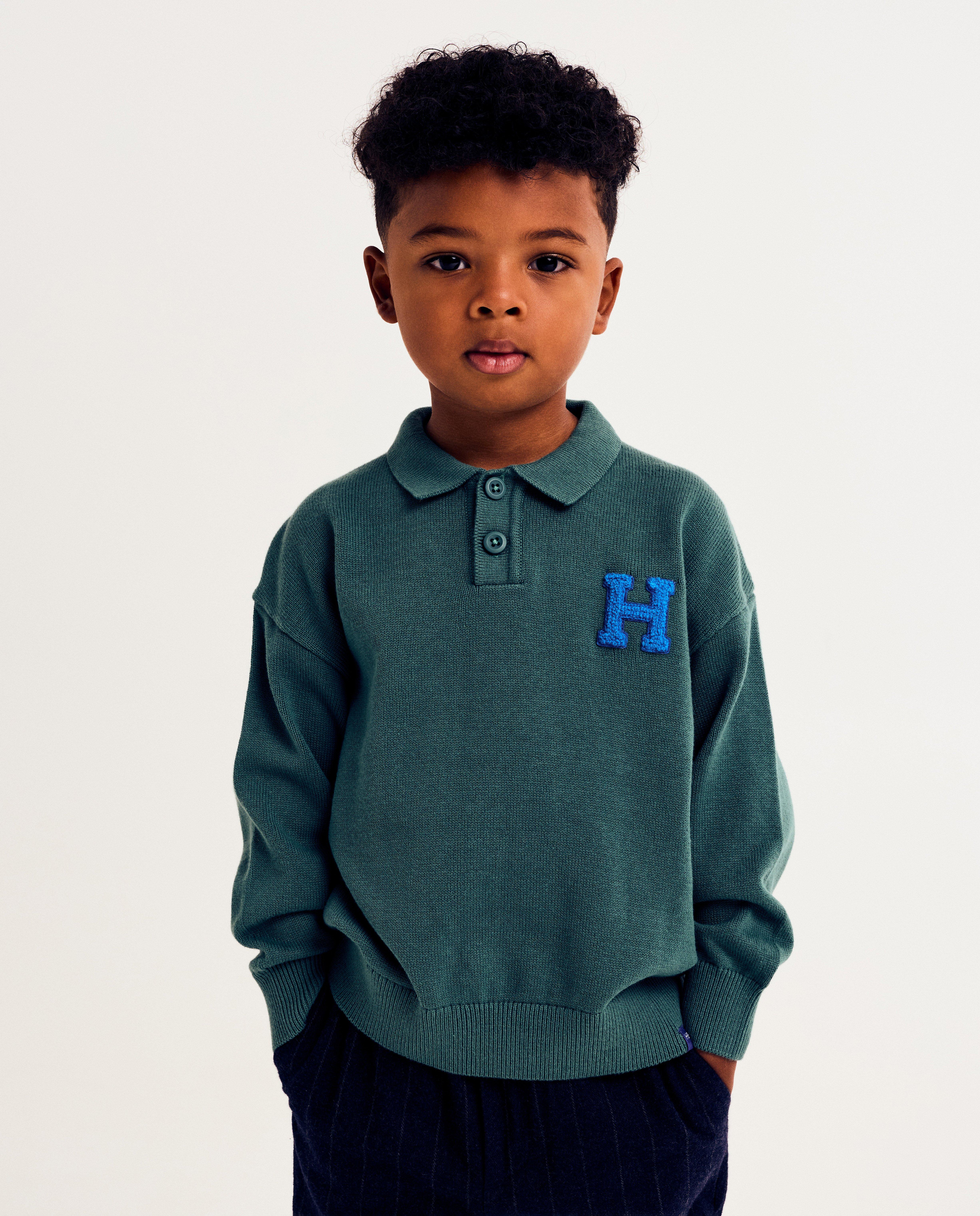 Pull avec écusson brodé