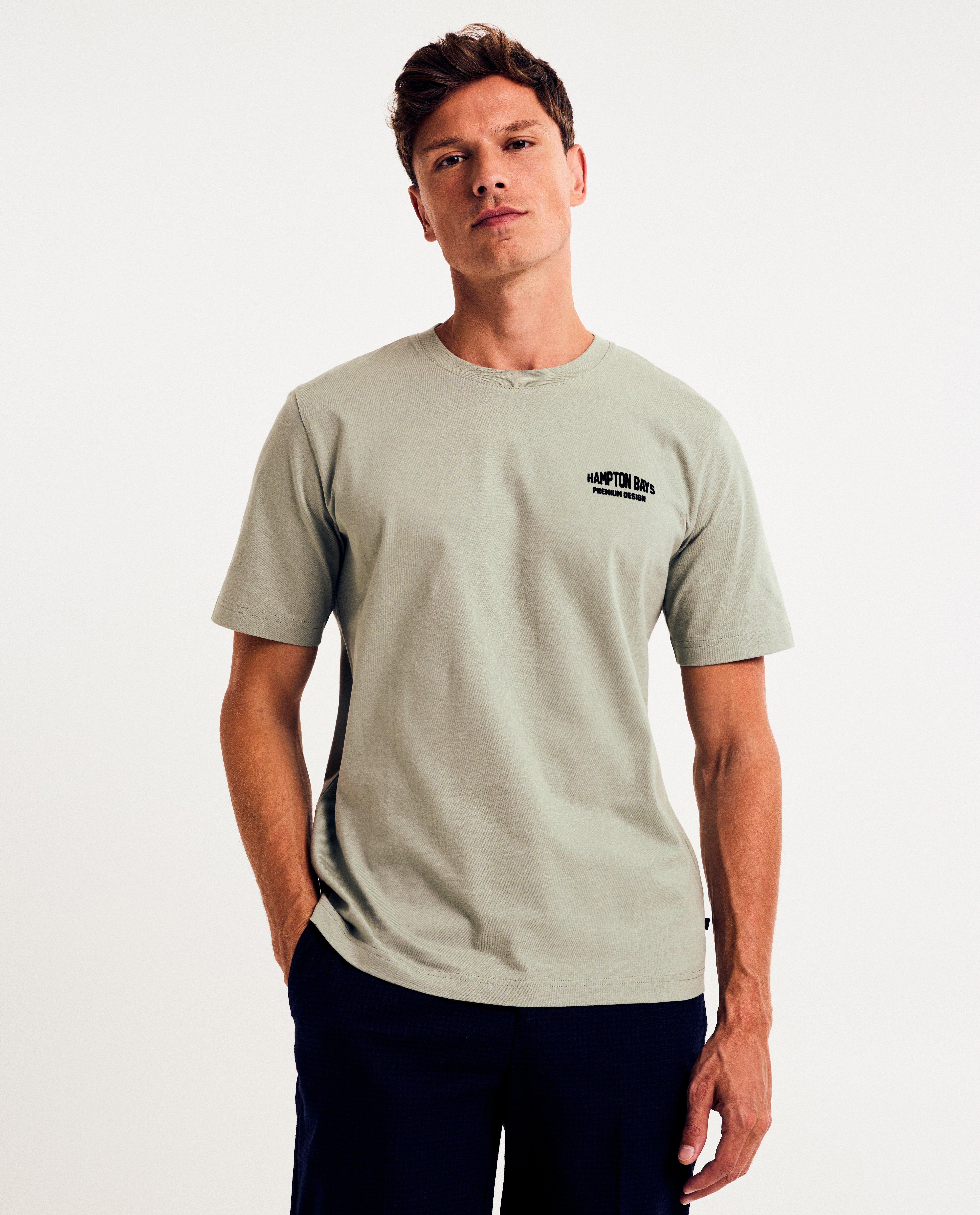 T-shirt met opschrift in reliëf