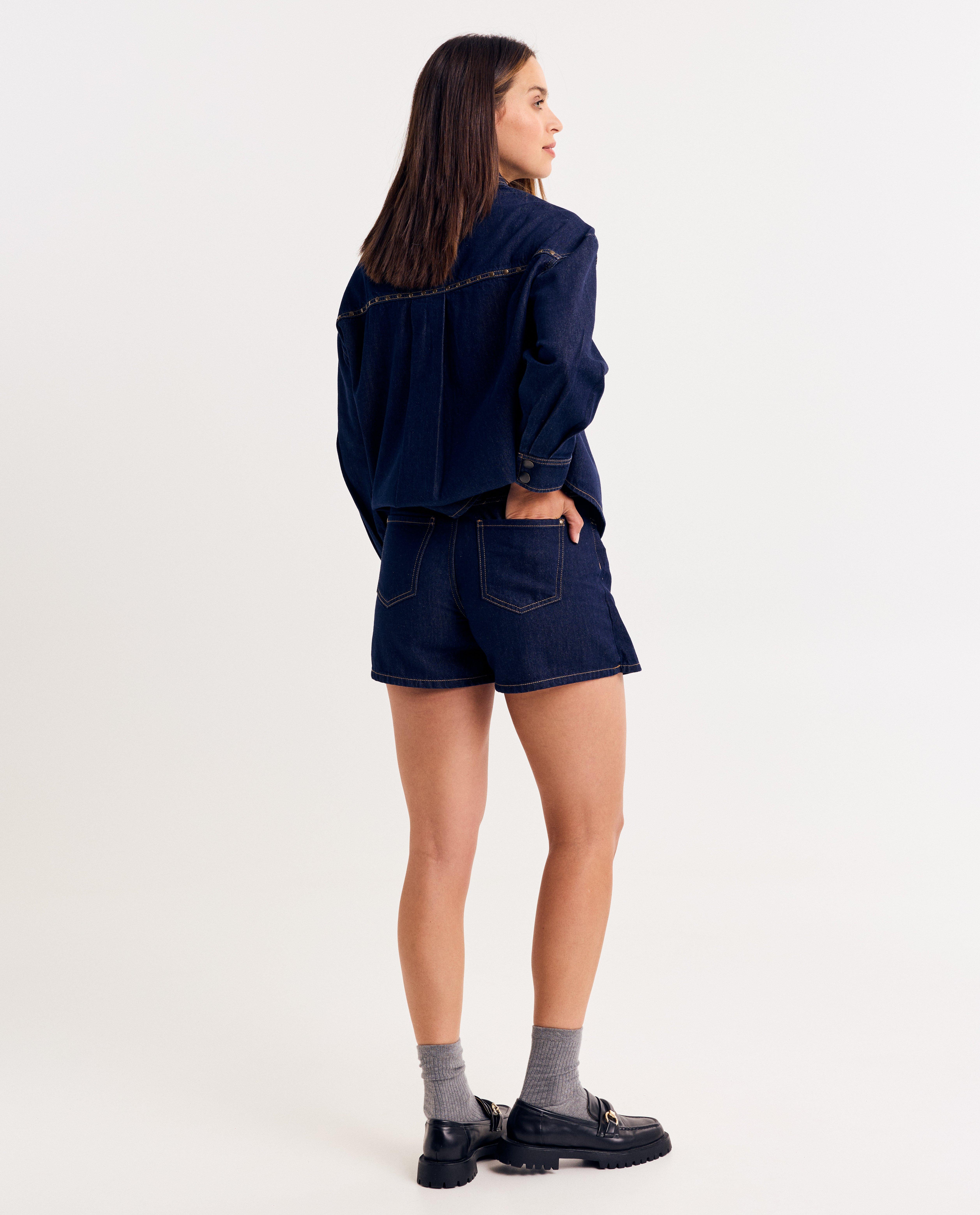 Rokken - Raw denim skort met asymmetrische sluiting