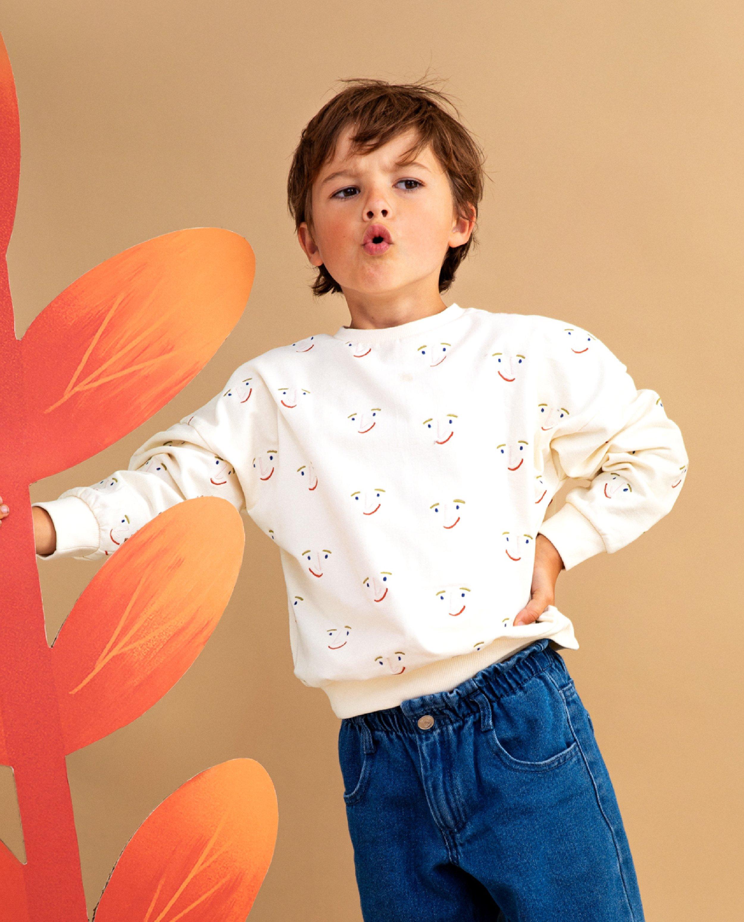 Sweater met print gezichtjes, unisex