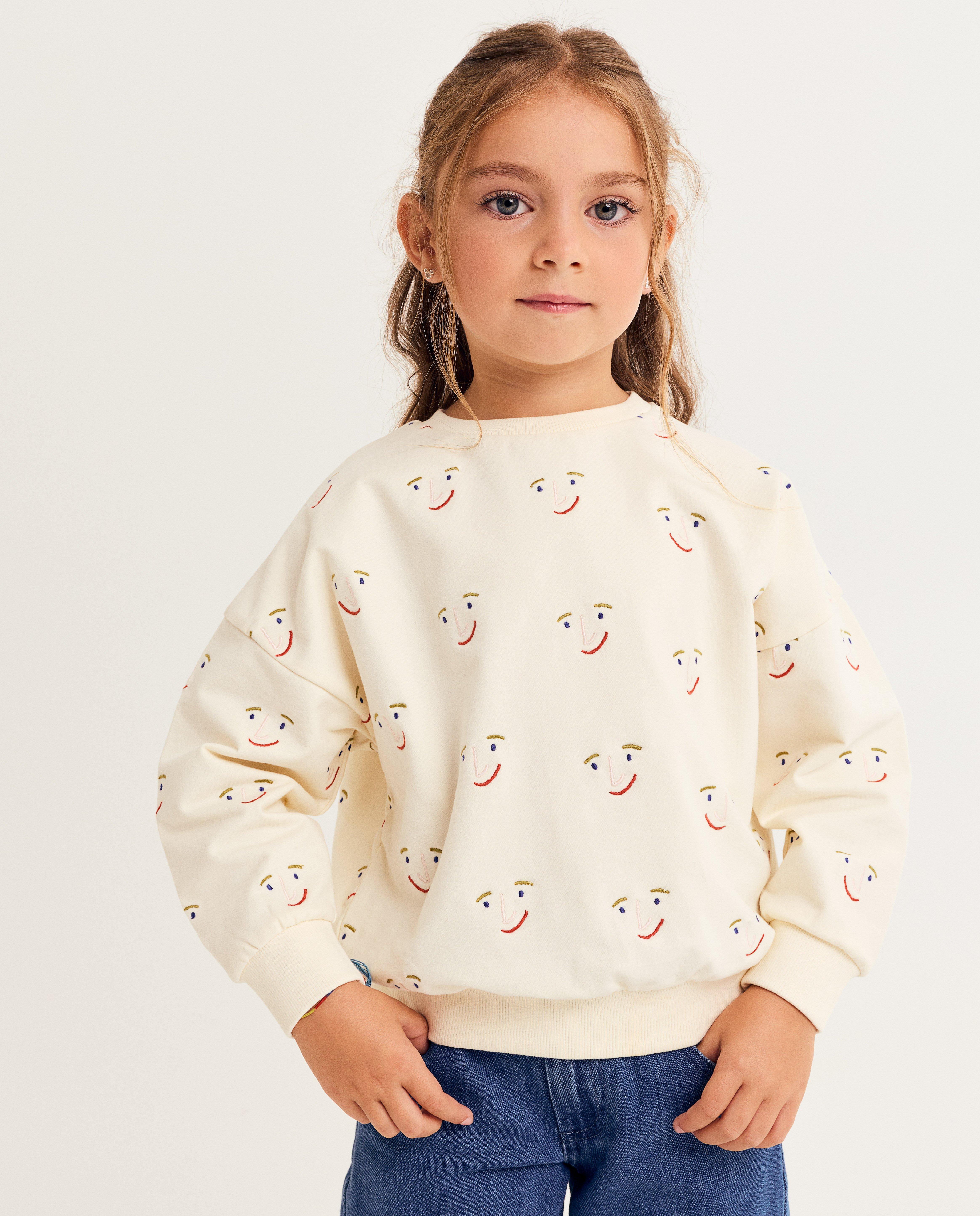 Sweaters - Sweater met print gezichtjes, unisex