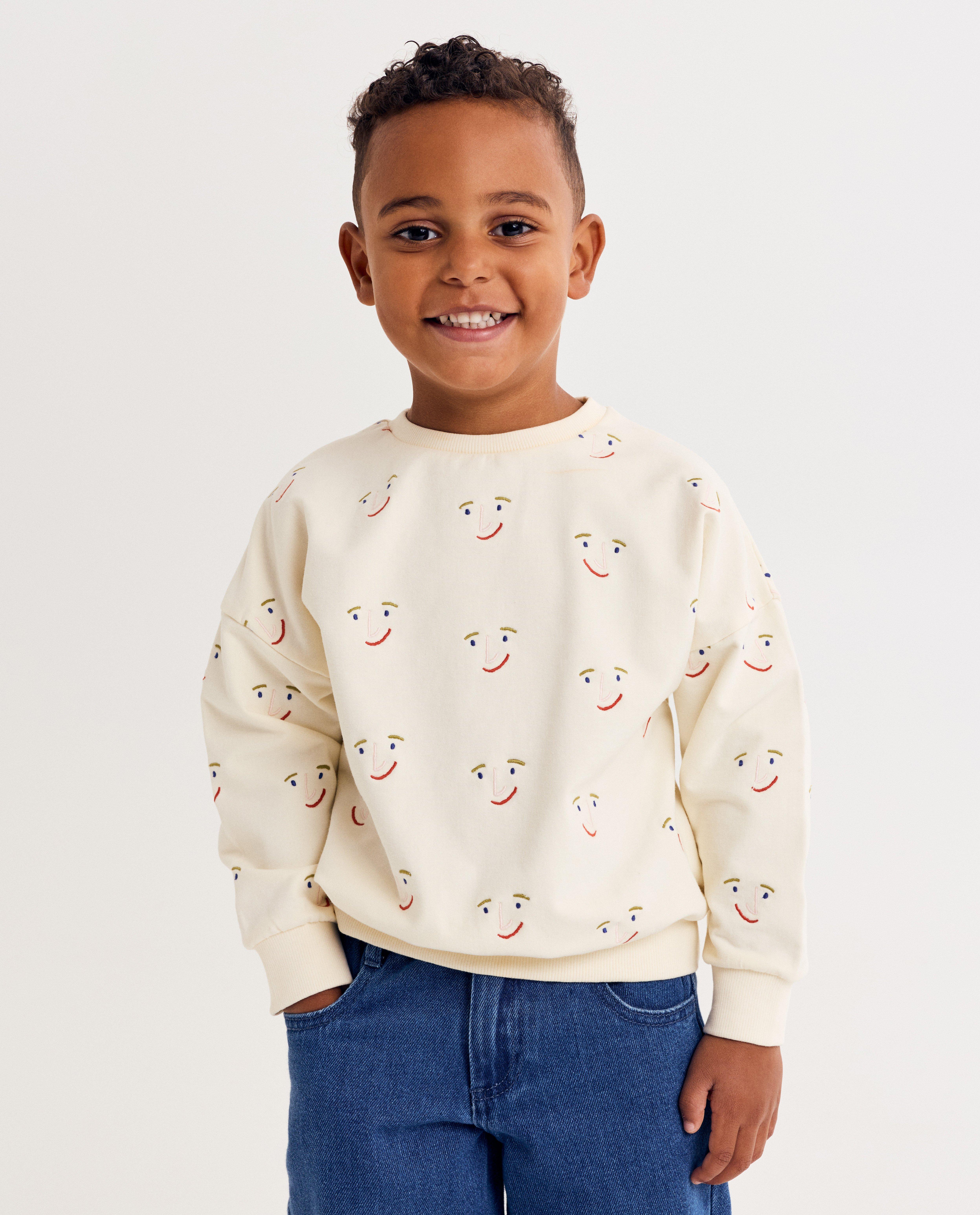 Sweaters - Sweater met print gezichtjes, unisex