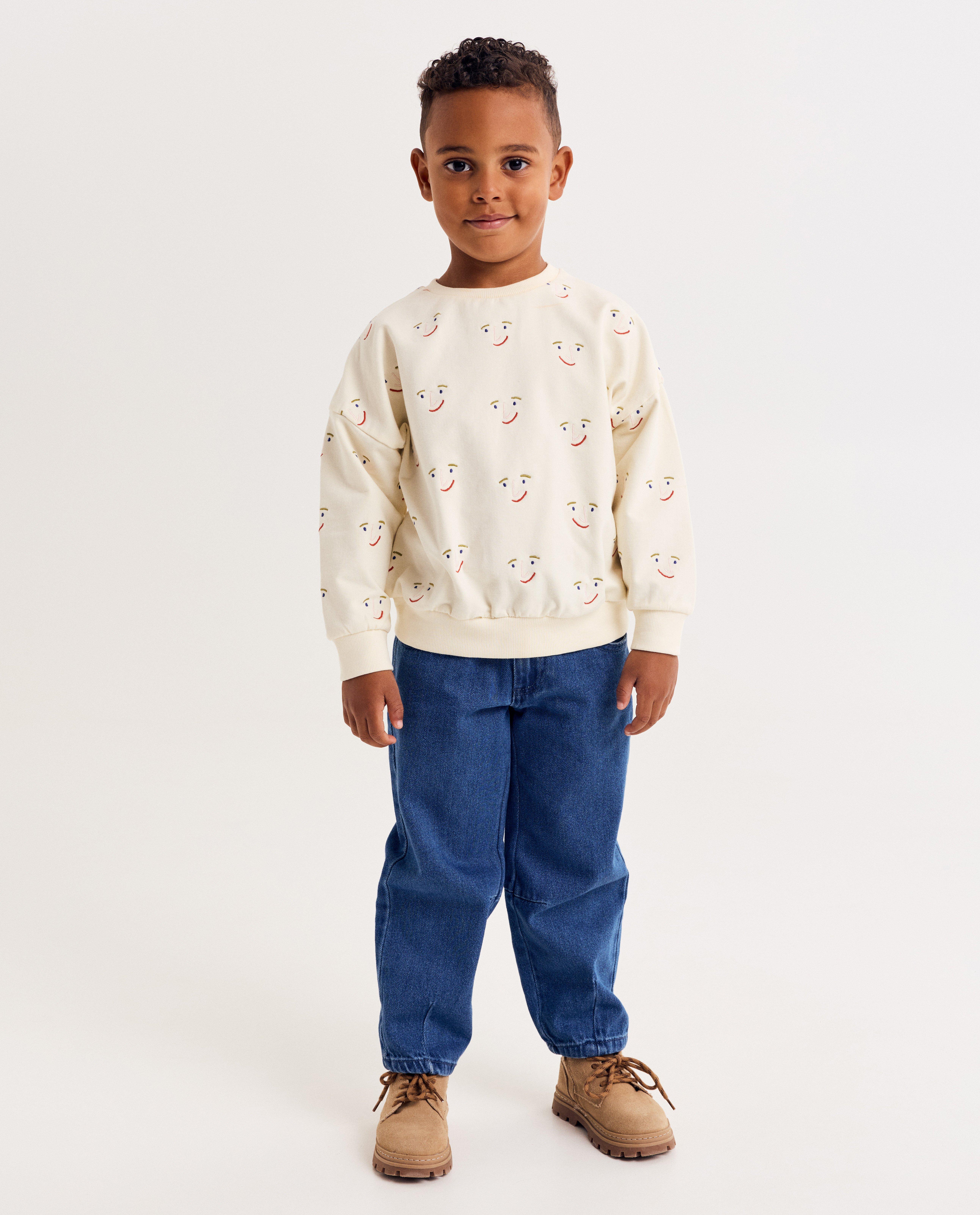 Sweaters - Sweater met print gezichtjes, unisex