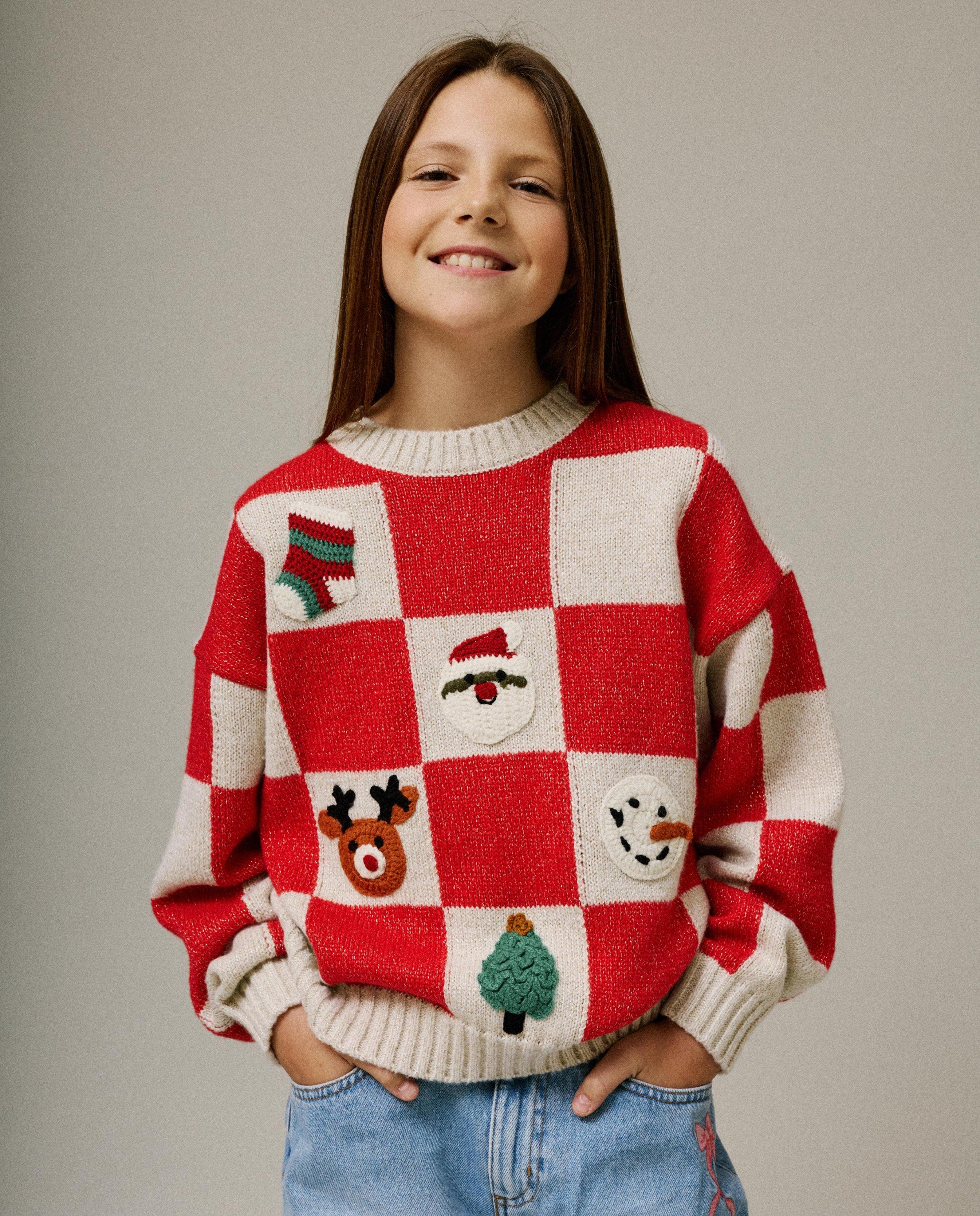 Pull de Noël avec motifs au crochet