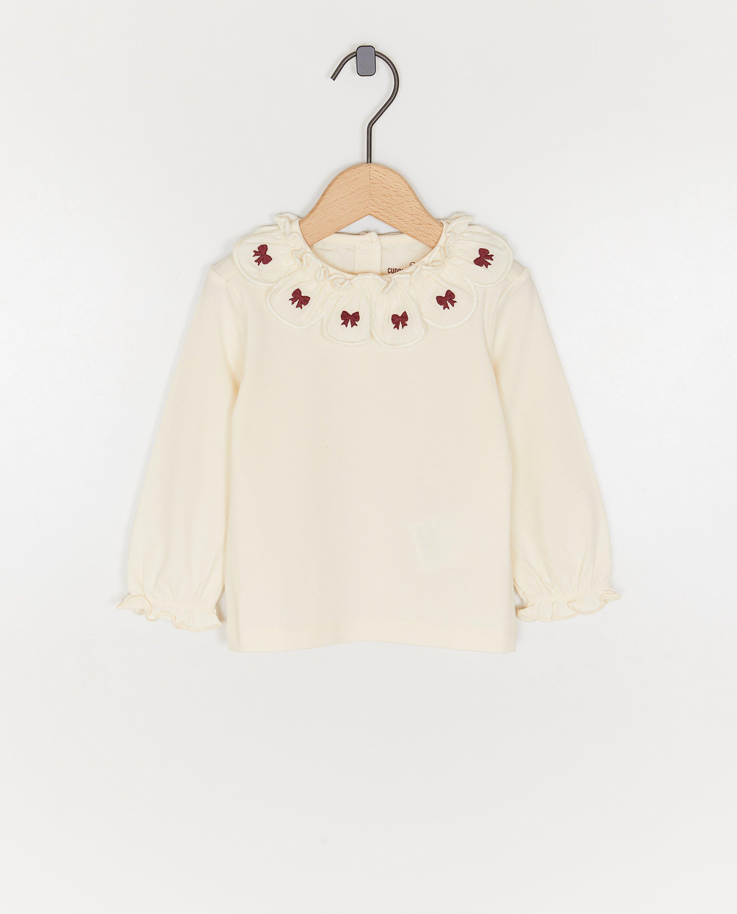 Blouse met geborduurde strikjes