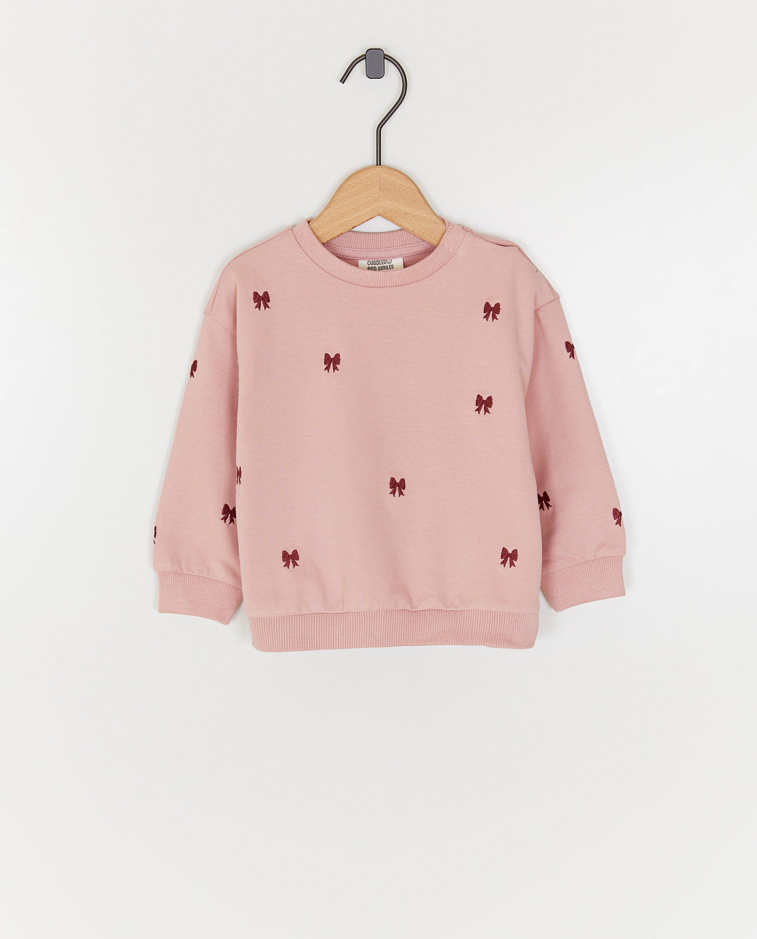Sweater met geborduurde strikjes