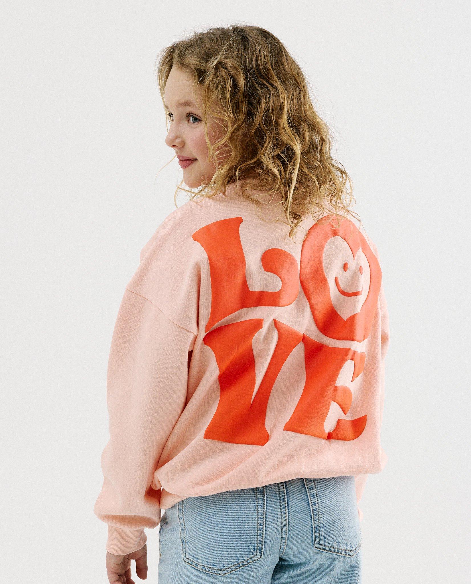 Sweat avec imprim&eacute; au dos - D&eacute;tails du produit - orange clair - image num&eacute;ro 1